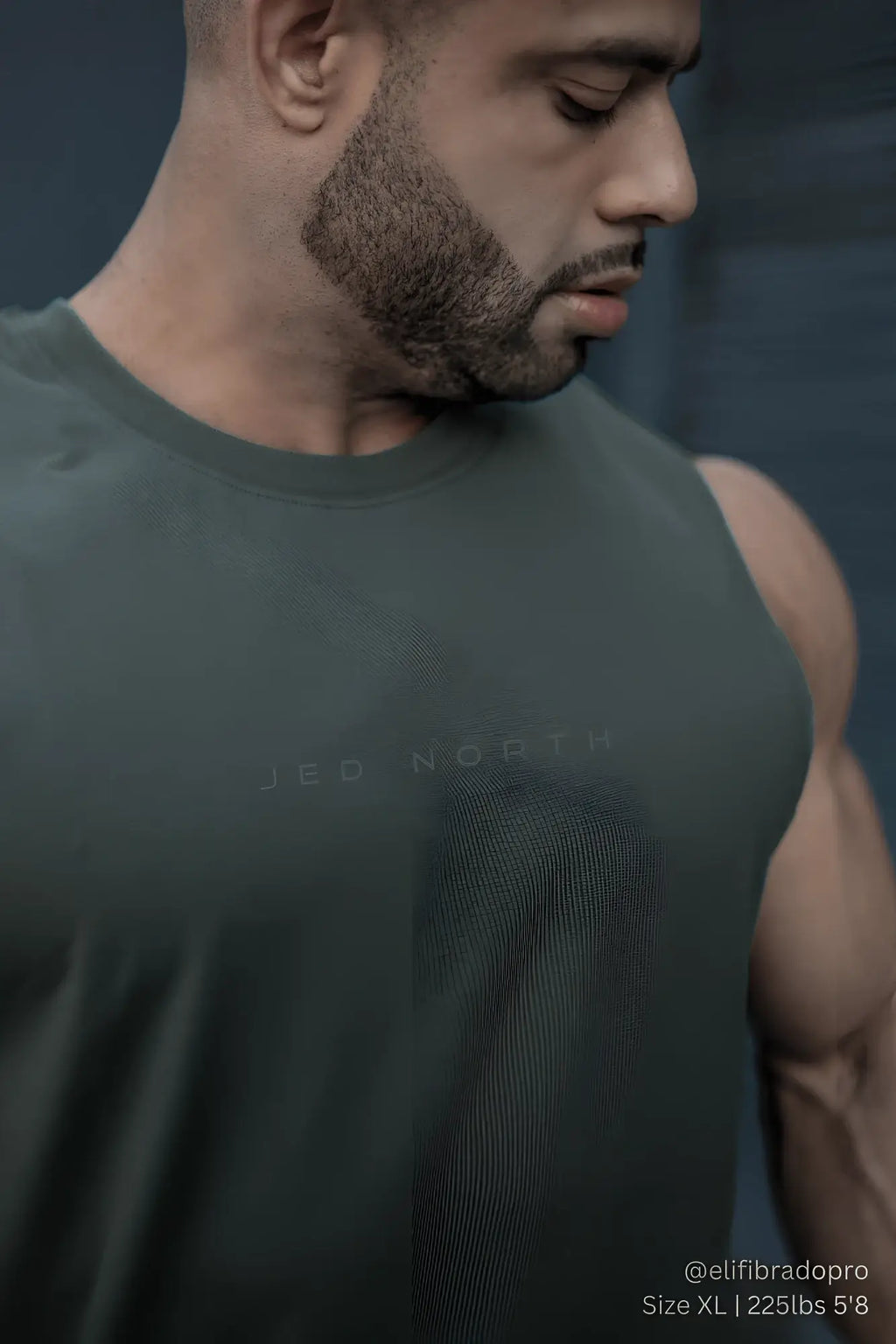 Apollo men’s sleeveless training tee in moss green with subtle jed north branding across the chest for athletic use