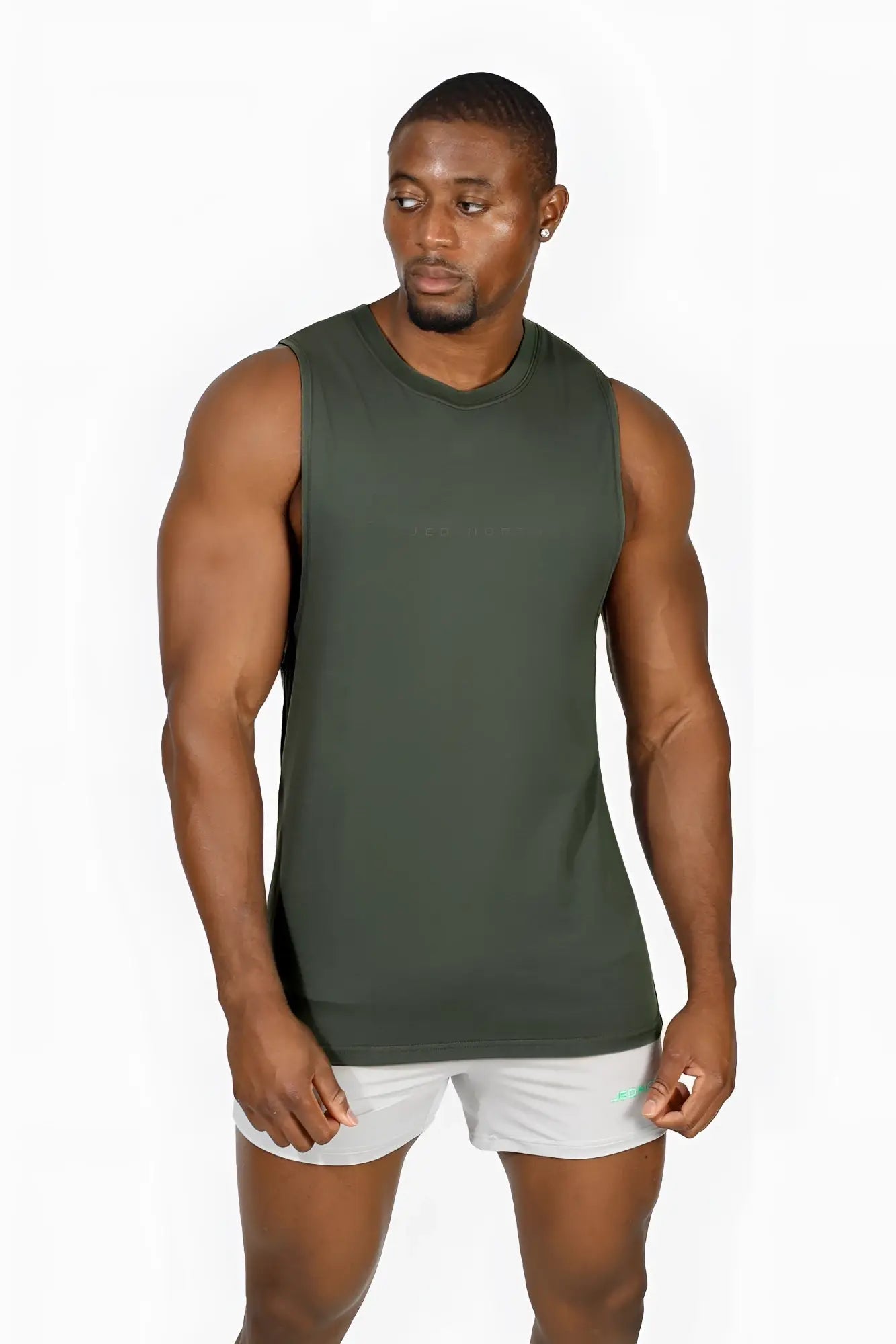 Apollo men’s sleeveless training tee moss green in olive with crew neckline and subtle ribbed texture for athletic use
