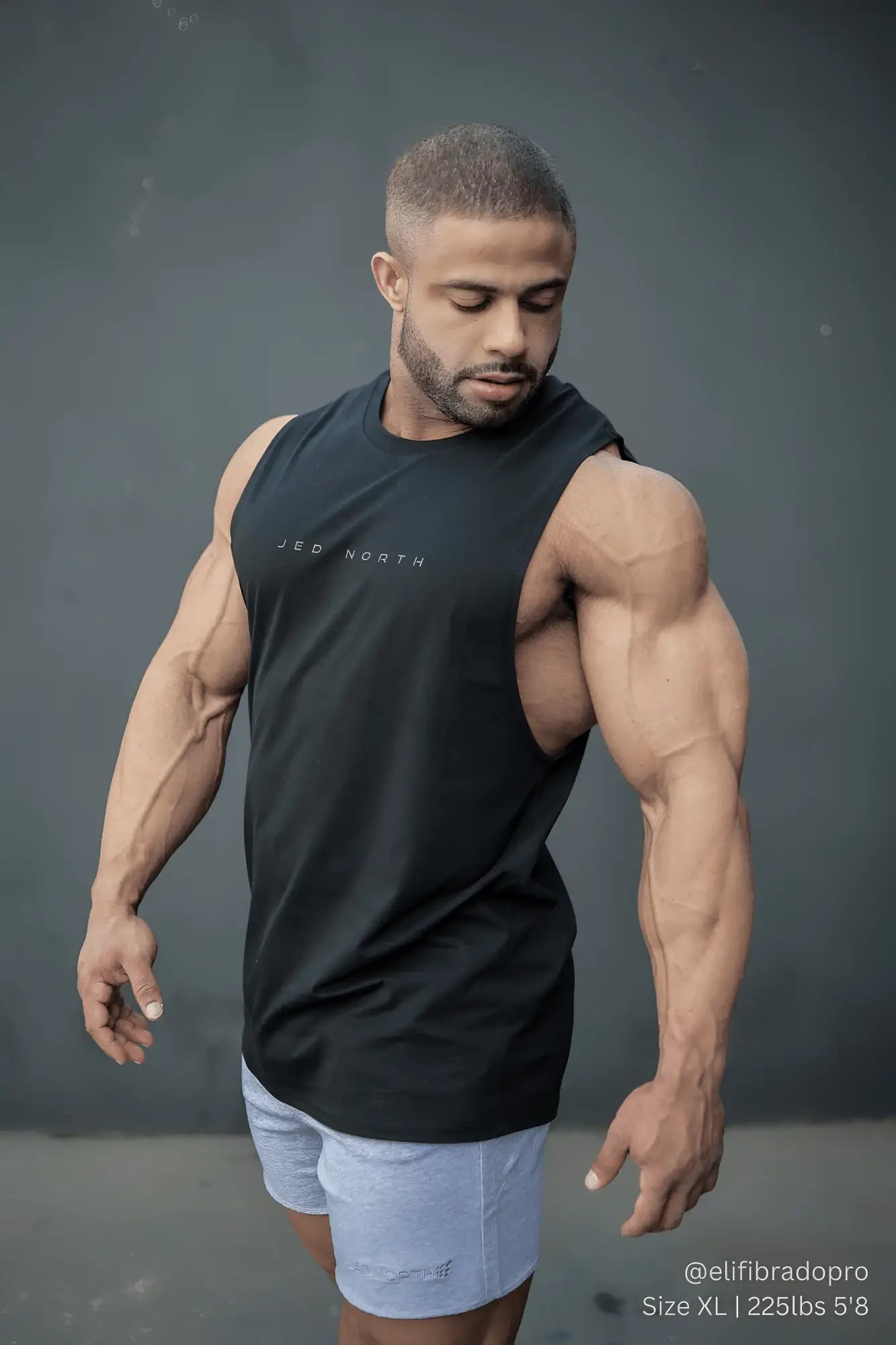 Black sleeveless athletic tank top with jed north logo in white on chest perfect for training and workouts