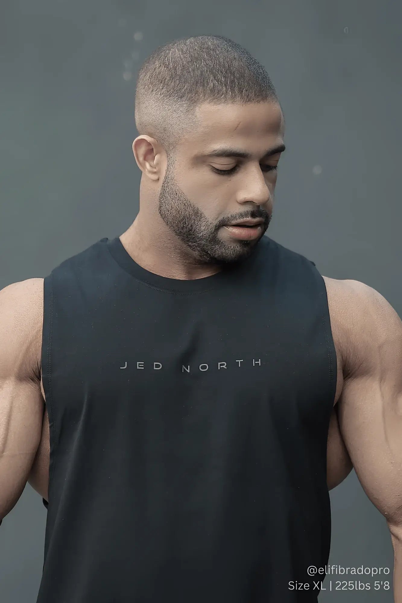 Jed North Apollo men’s sleeveless training tee in obsidian black with subtle white logo for athletic workouts