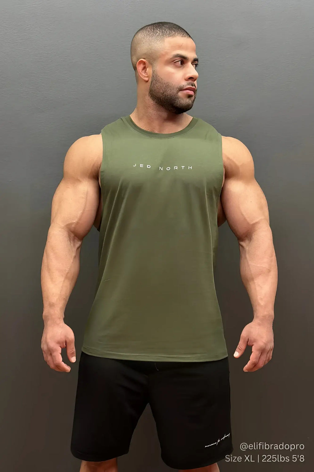 Olive green sleeveless jed north apollo men’s training tank top with white logo designed for athletic performance