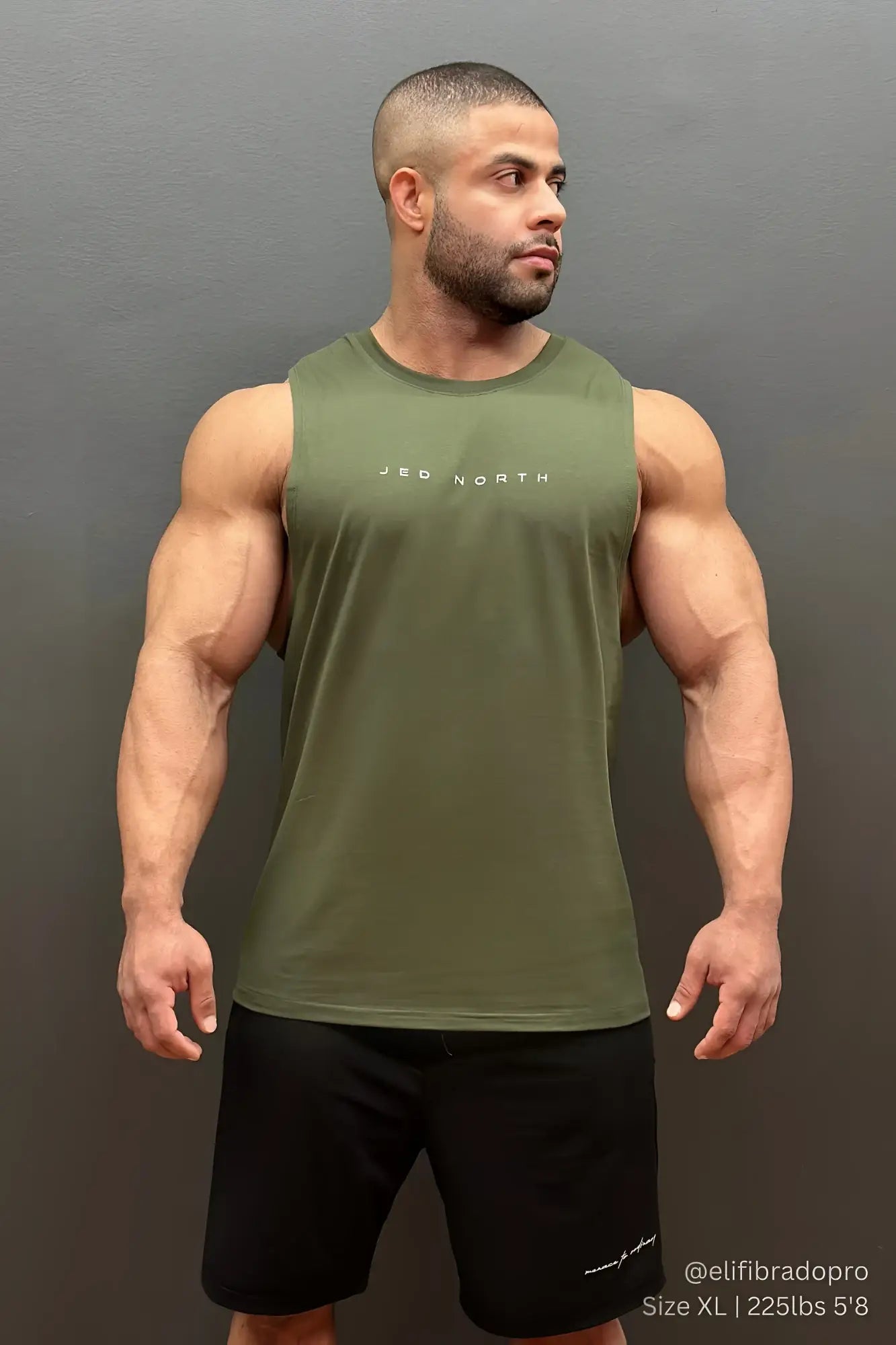 Olive green sleeveless jed north apollo men’s training tank top with white logo designed for athletic performance