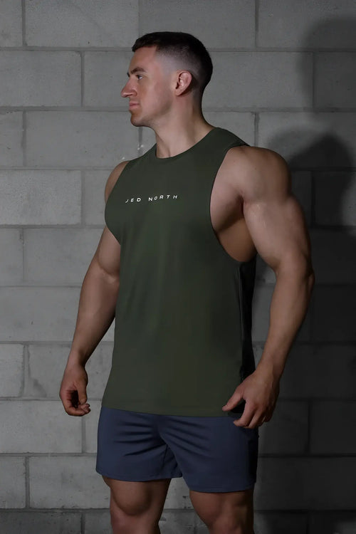 Olive green sleeveless tank top with white jed north logo printed on chest for men’s training by jed north