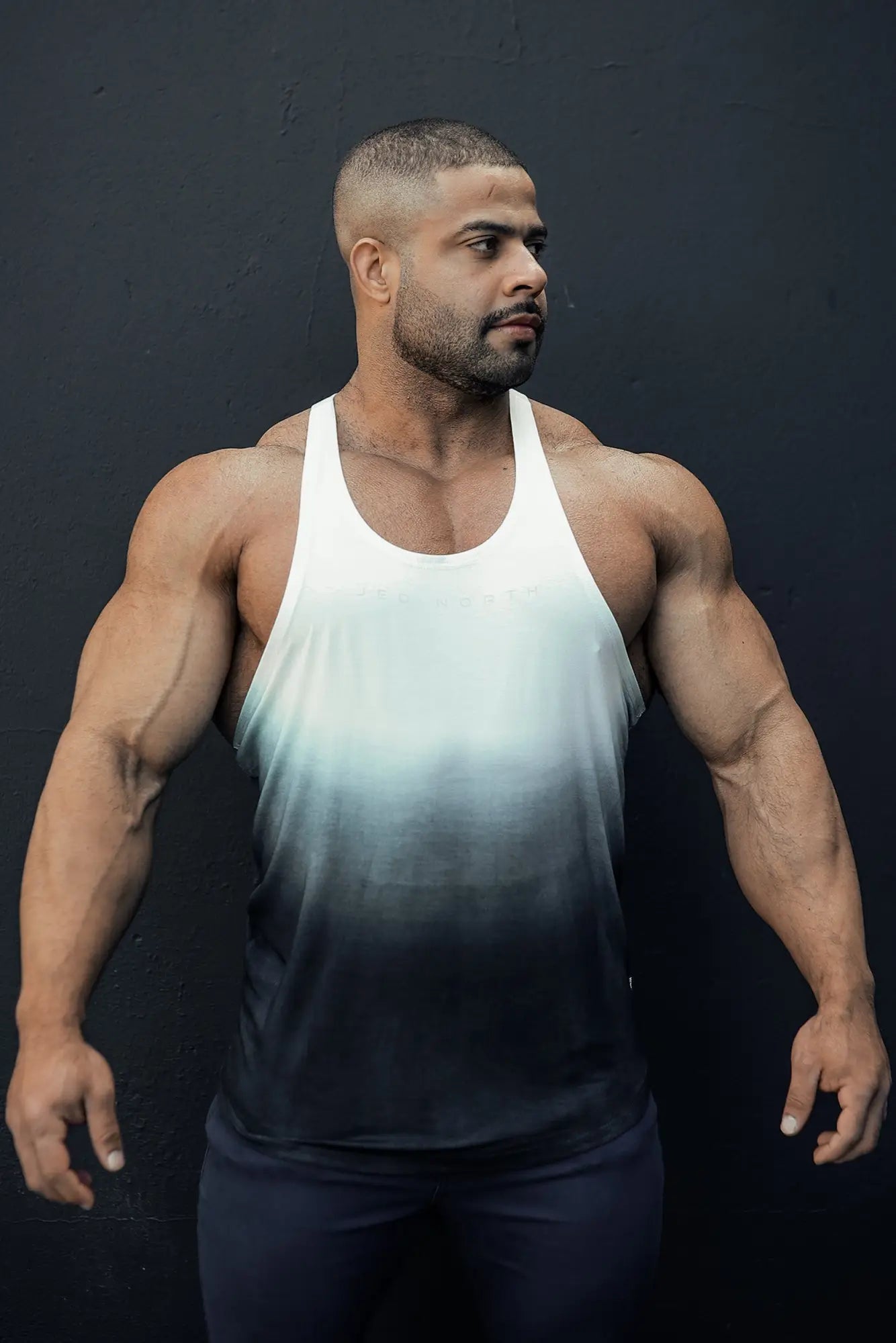 A sleek white-to-black gradient classic bodybuilding racerback stringer tank top with a smooth modern design