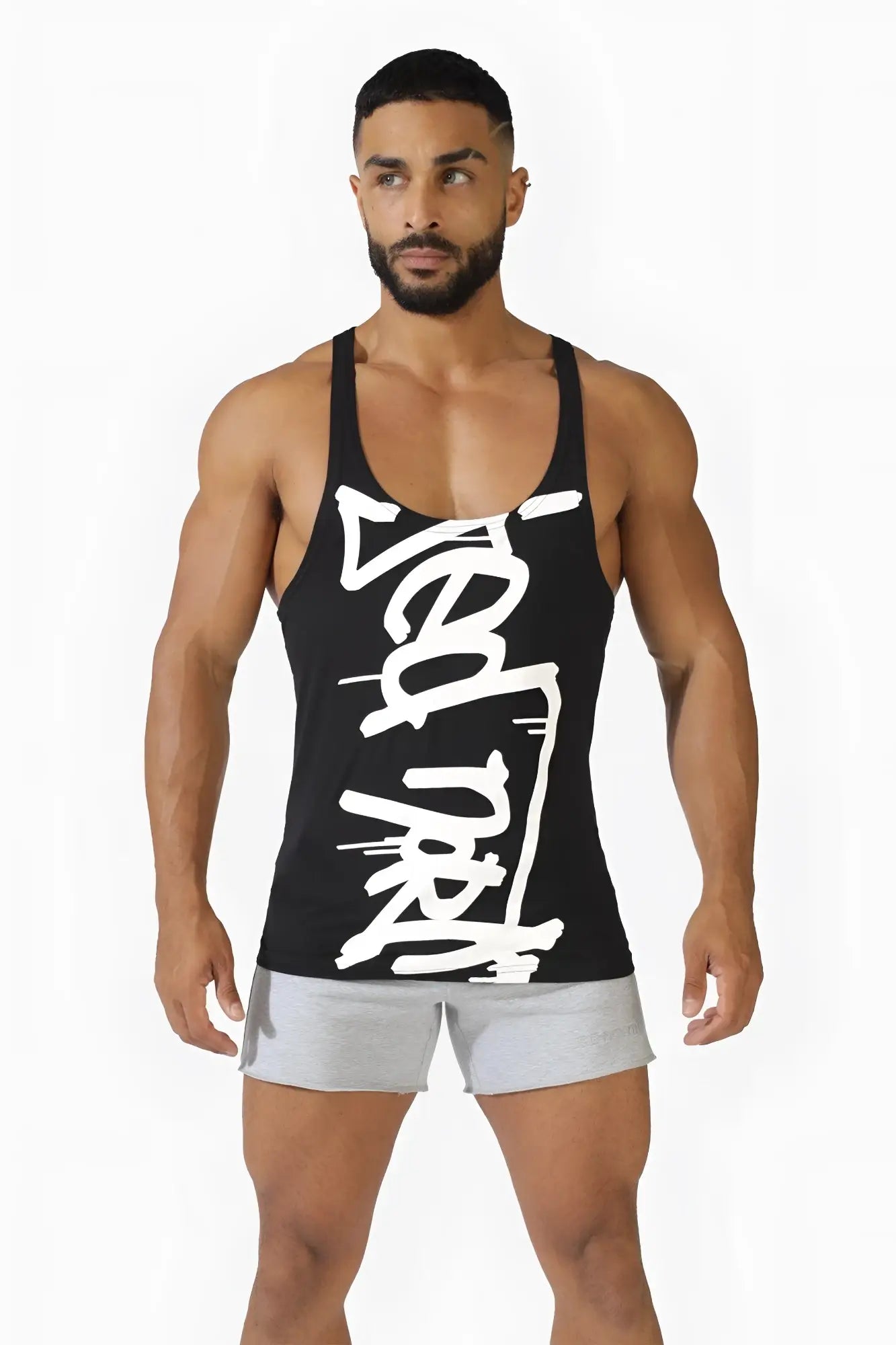 Classic bodybuilding racerback stringer tank top in black with bold white brushstroke logo across the front