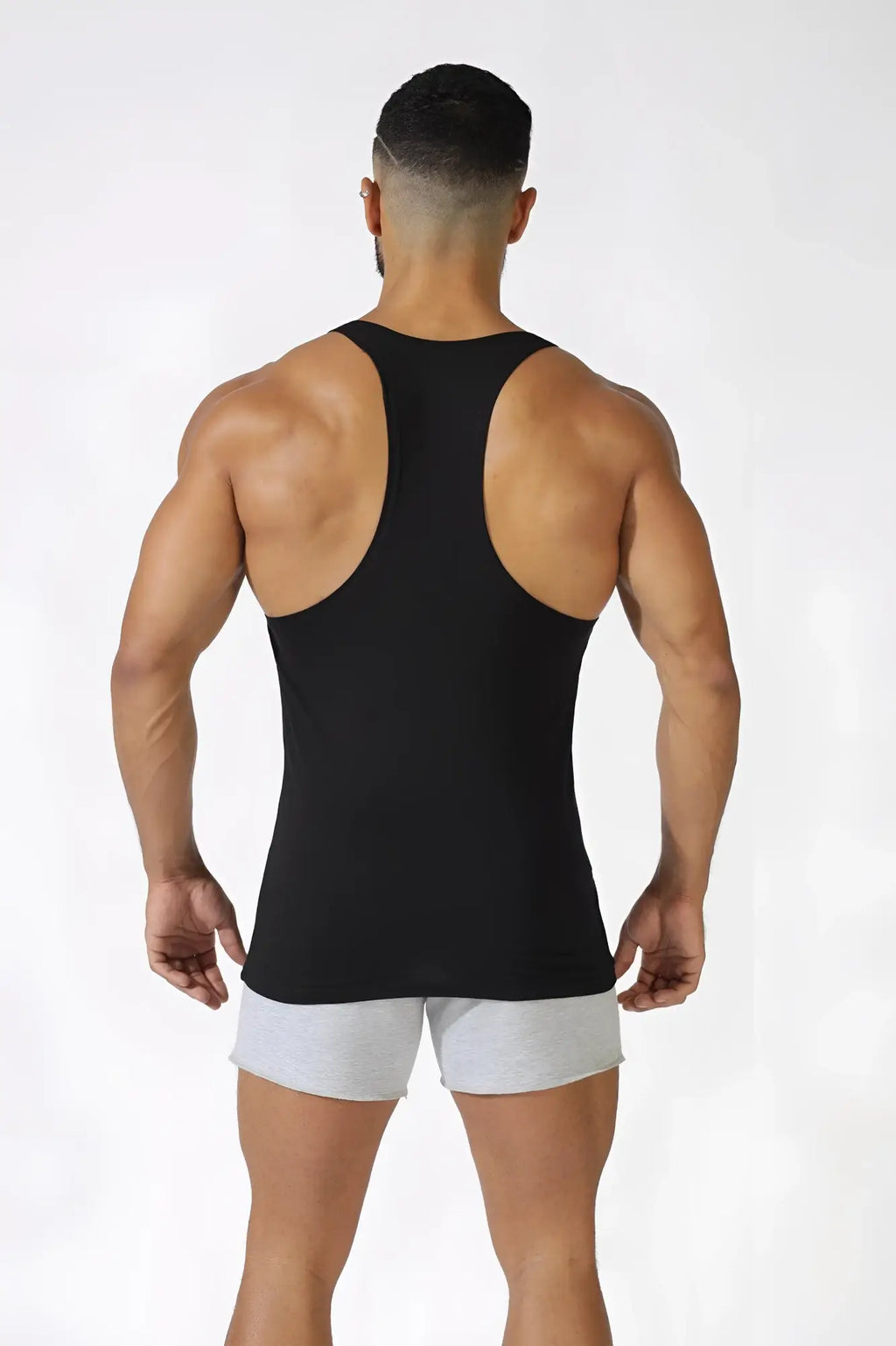 Black racerback tank top with sleek form-fitting design featuring logo for classic bodybuilding use visible from back