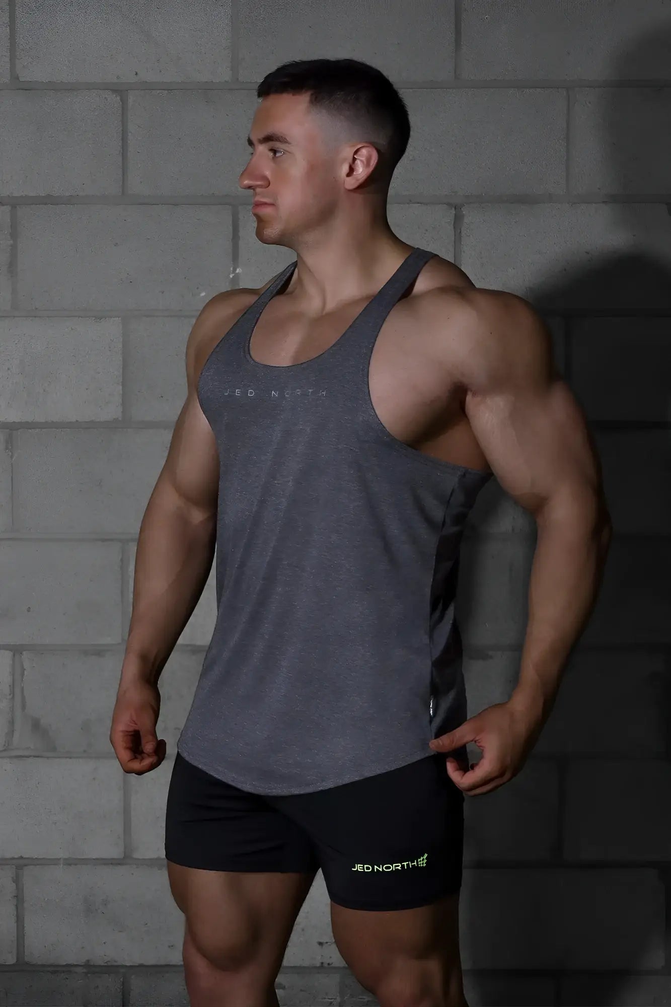 Gray heathered jed north classic bodybuilding racerback stringer tank top with black side panels and subtle logo