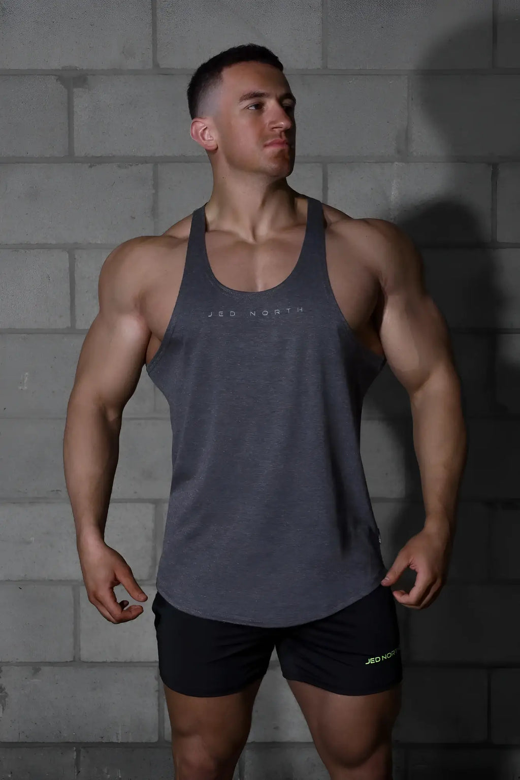 Gray heathered jed north classic bodybuilding racerback stringer tank top with white logo print on the chest