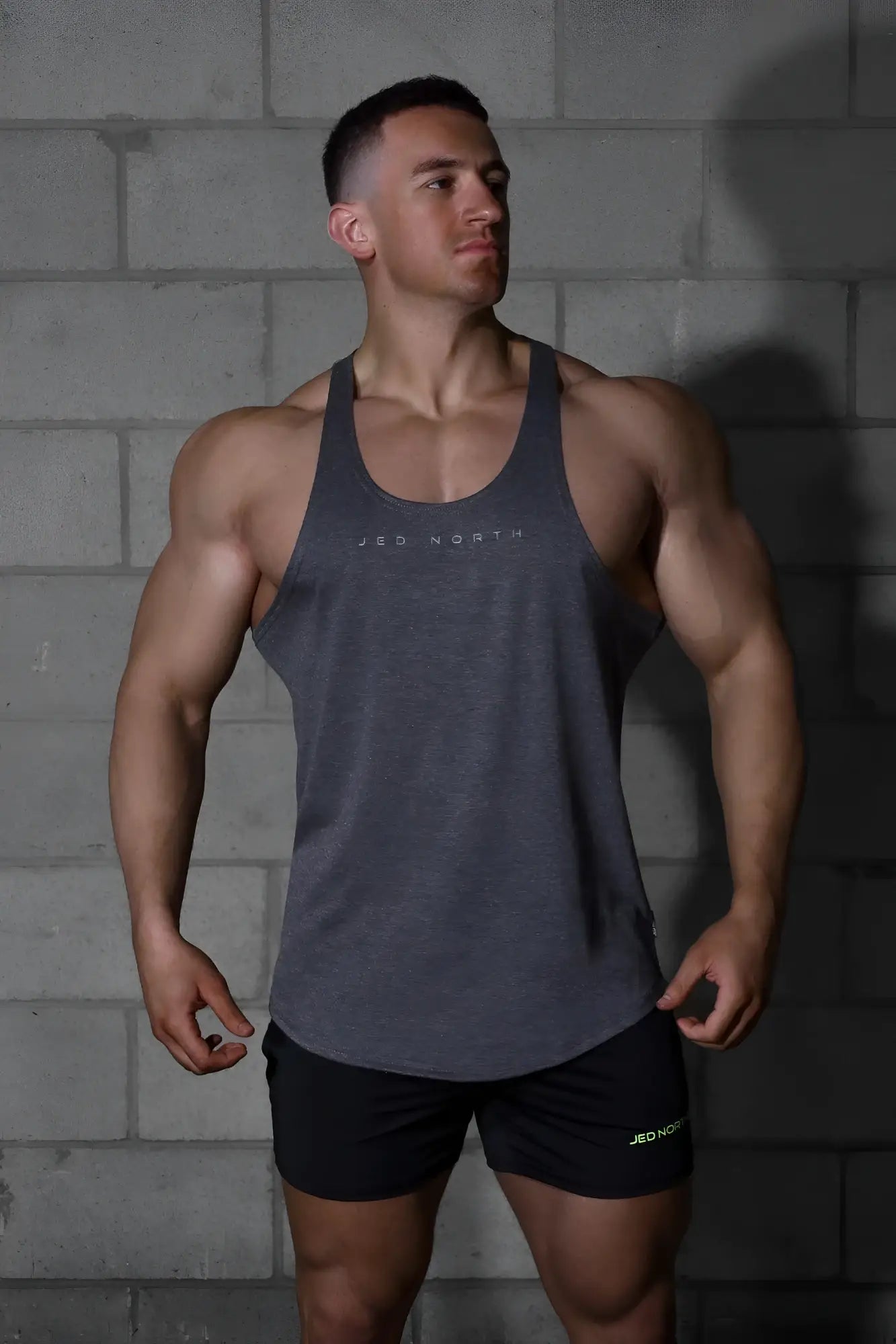 Gray heathered jed north classic bodybuilding racerback stringer tank top with white logo print on the chest