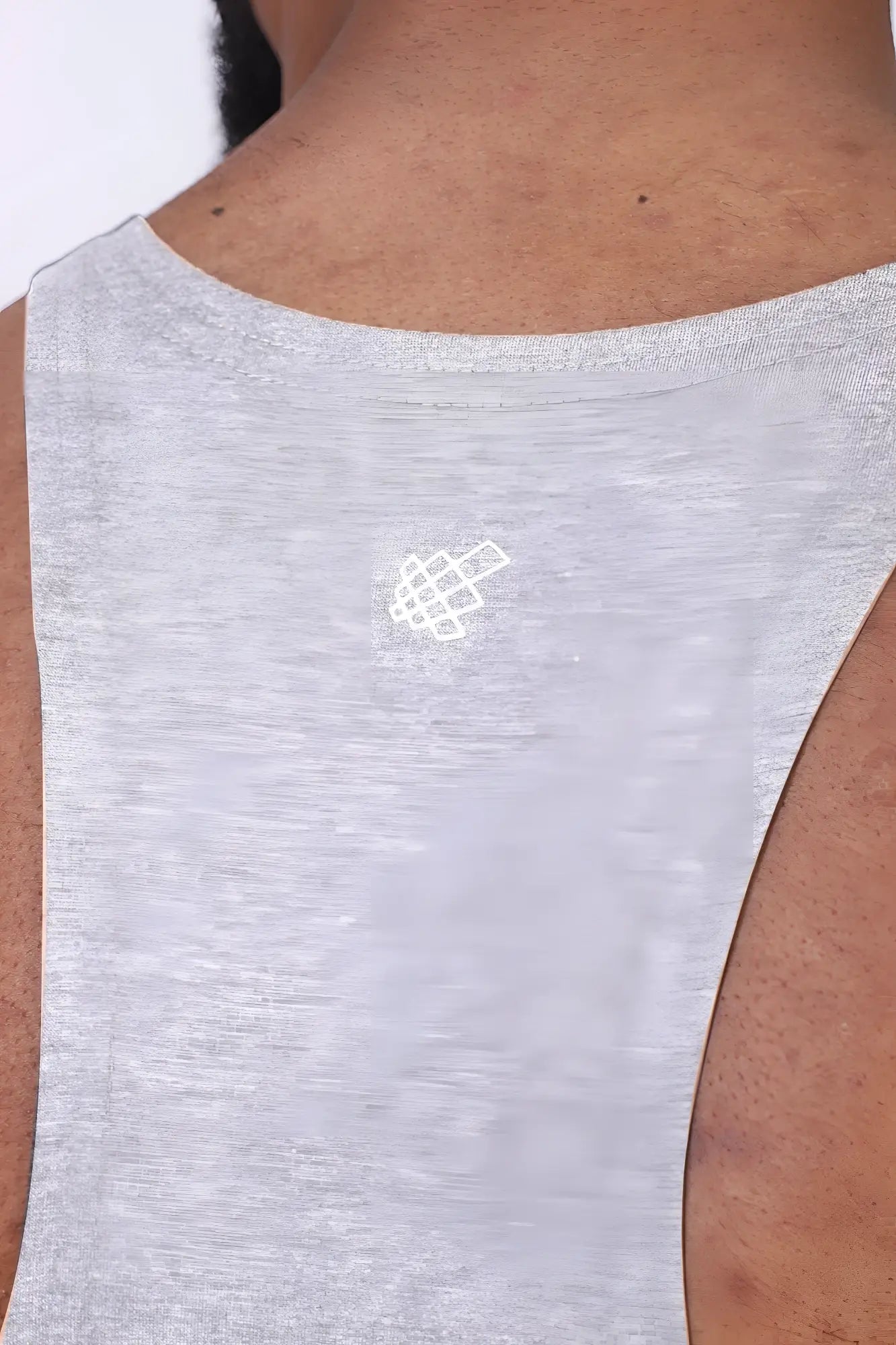 Gray heathered sleeveless tank top with white geometric logo near neckline from jed north classic bodybuilding racerback stringer light gray