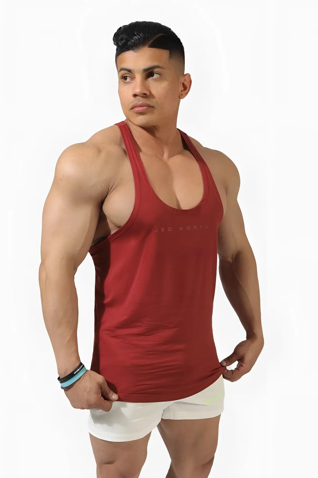 Classic bodybuilding racerback stringer maroon sleeveless tank top with subtle brand logo across the chest