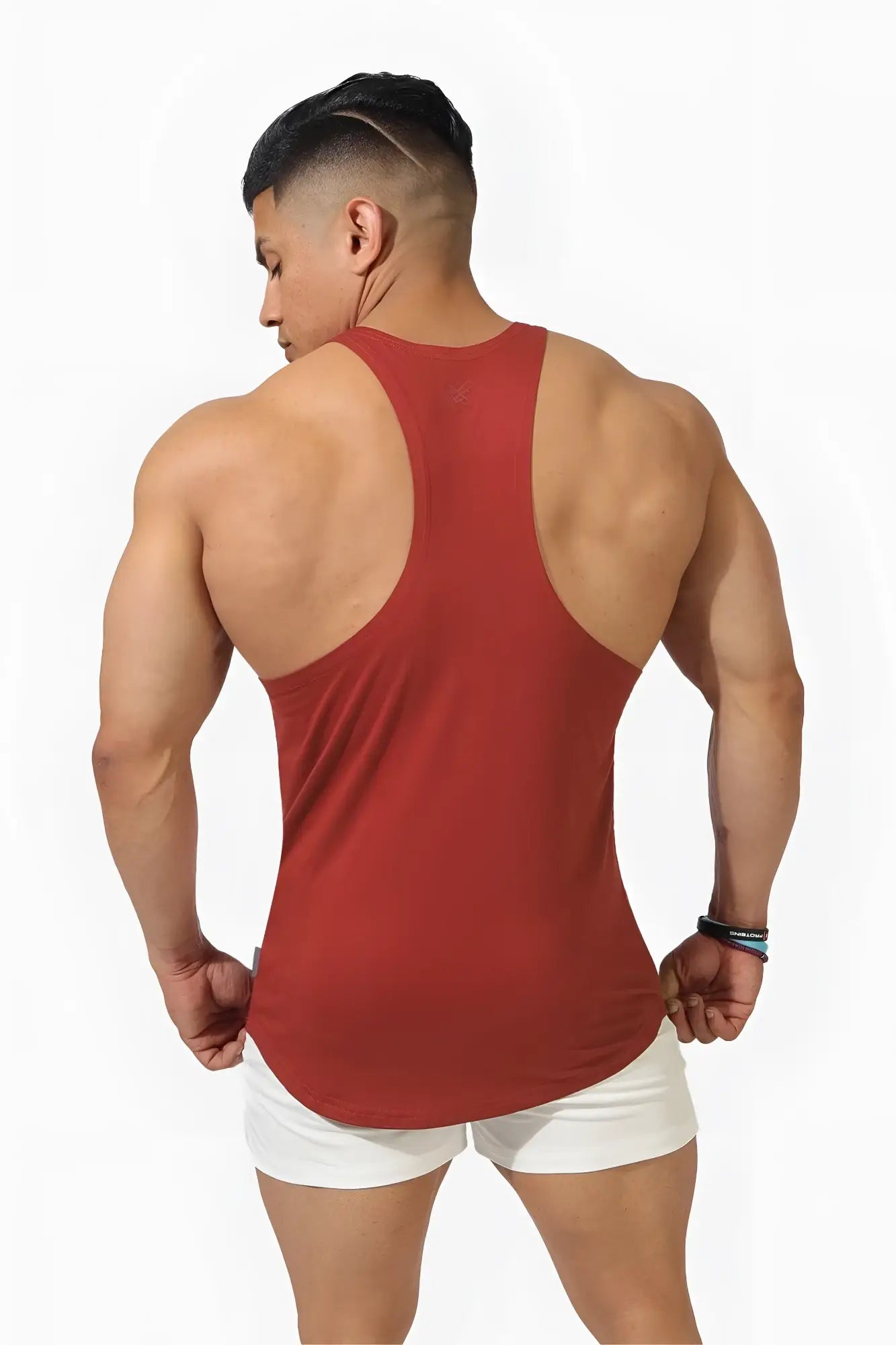 A sleek red maroon classic bodybuilding racerback stringer tank top with smooth fabric finish viewed from the back