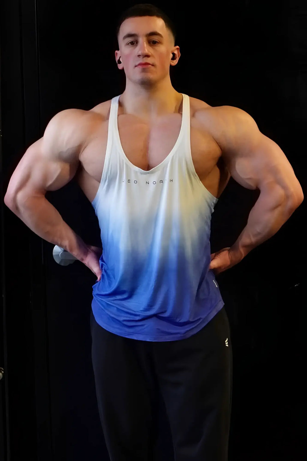 Classic bodybuilding racerback stringer tank top with ombre blue gradient and subtle red nort logo across chest