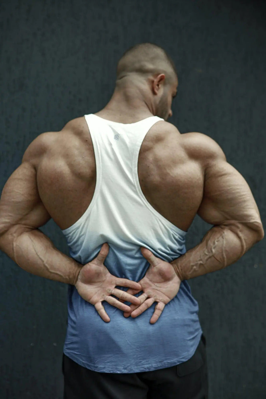 White and blue gradient tank top with racerback design shown from the back in classic bodybuilding racerback stringer ombre blue style