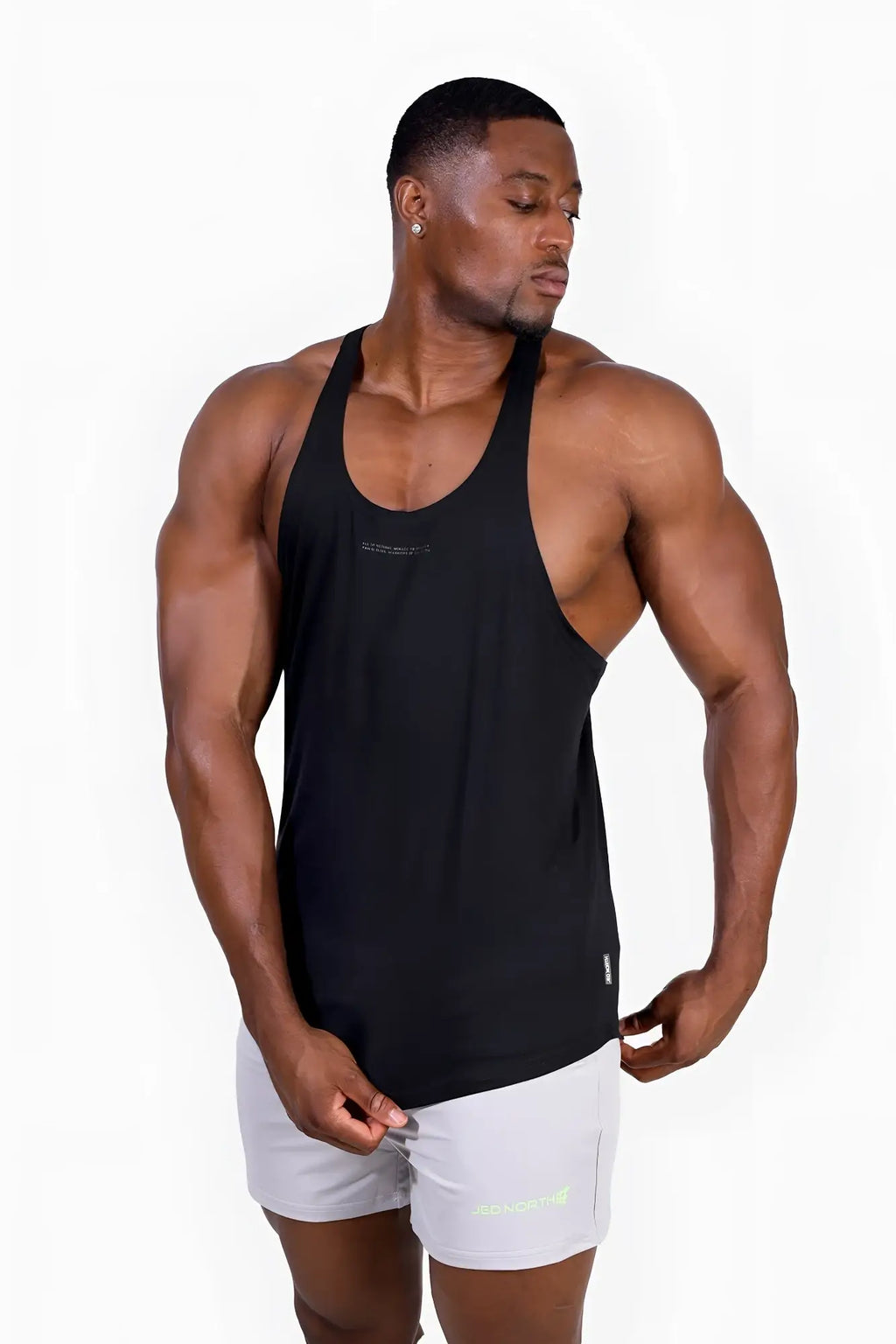 Black sleeveless classic bodybuilding racerback stringer tank top with scoop neckline and subtle chest branding
