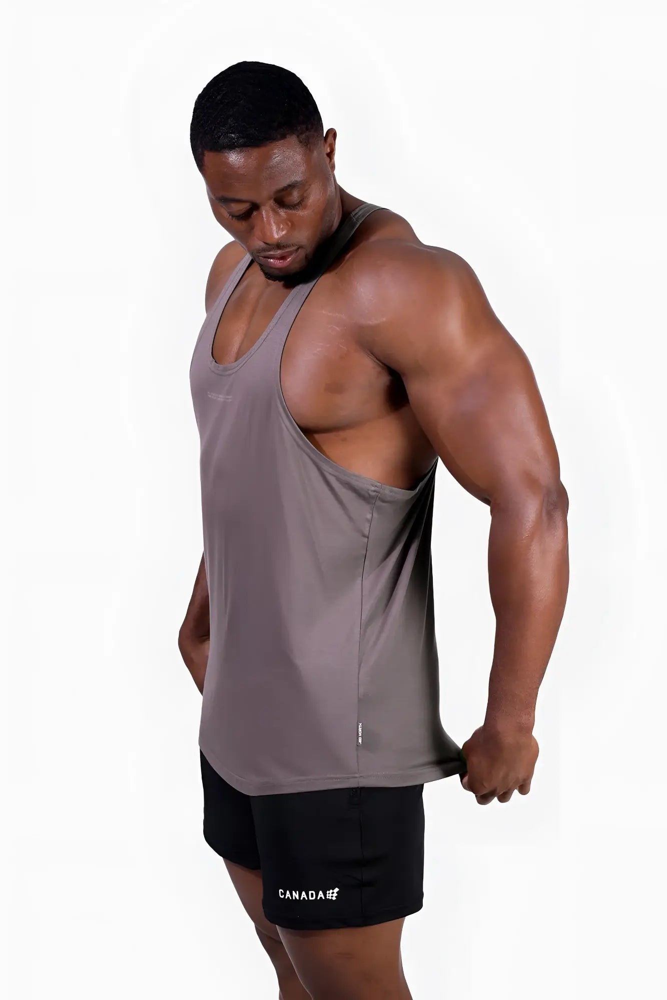 A sleek gray classic bodybuilding racerback stringer tank top with subtle side seam detailing for athletic use