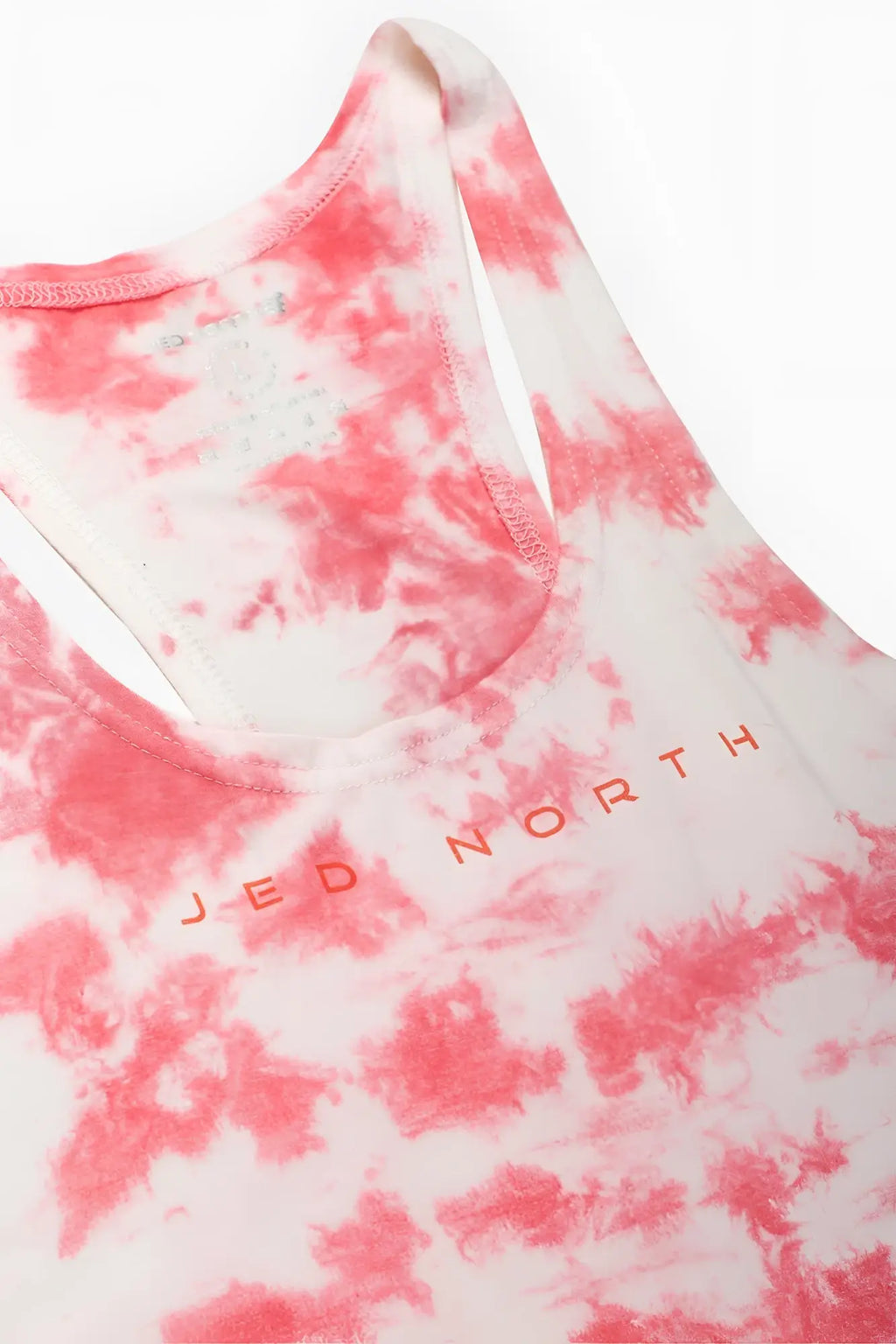 Classic bodybuilding racerback stringer tank top in pink and white tie dye with jed north orange logo on chest