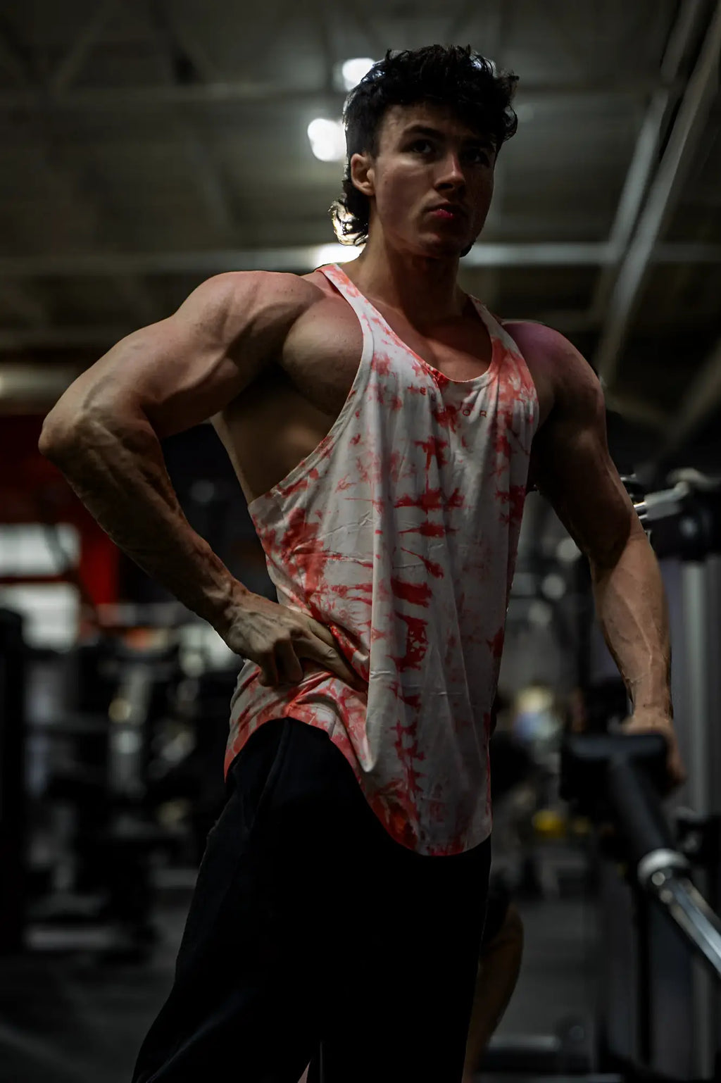 Classic bodybuilding racerback stringer tank top in white and red tie dye for gym and casual wear