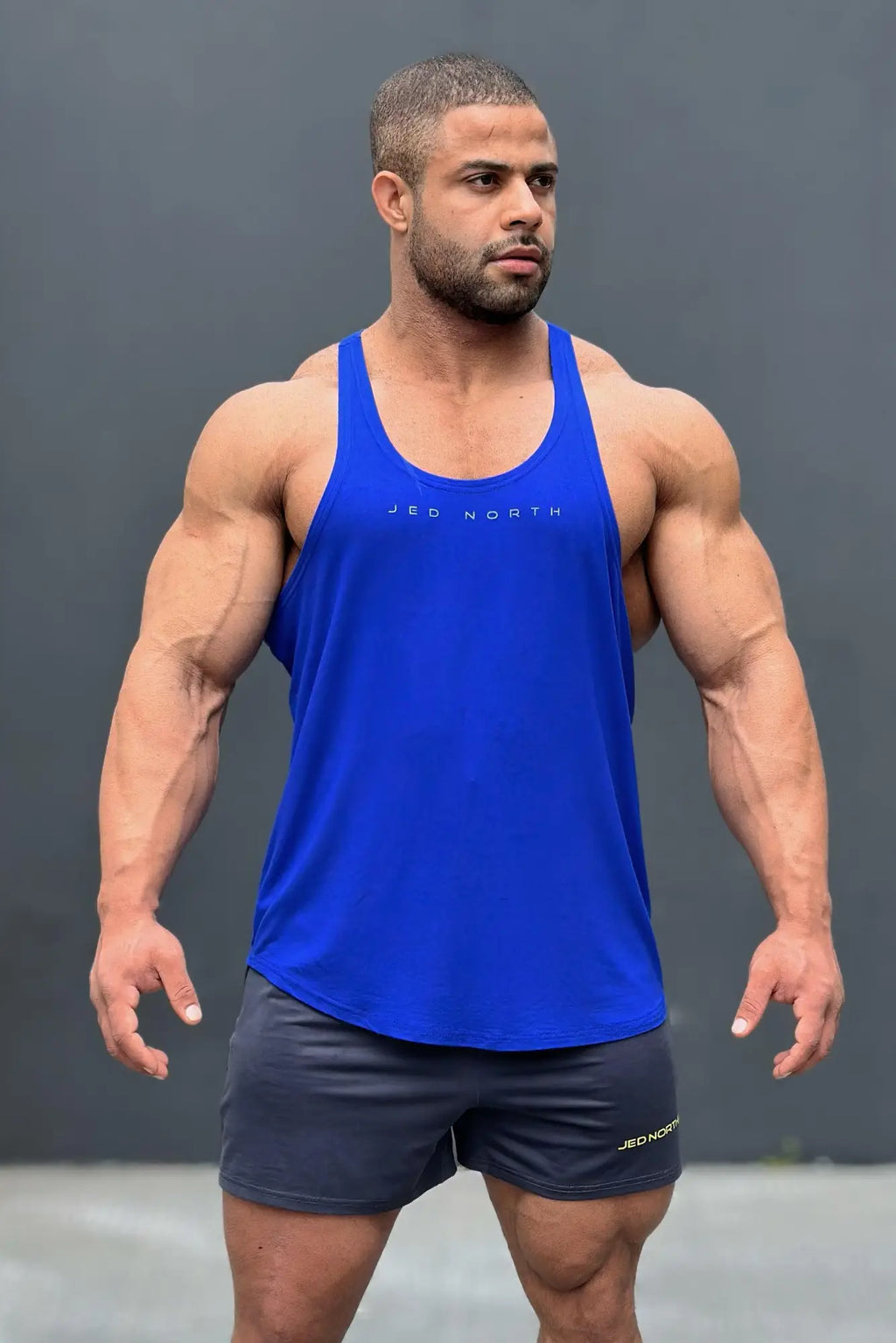 Blue jed north classic bodybuilding racerback stringer tank top with simple fitted design in royal blue color
