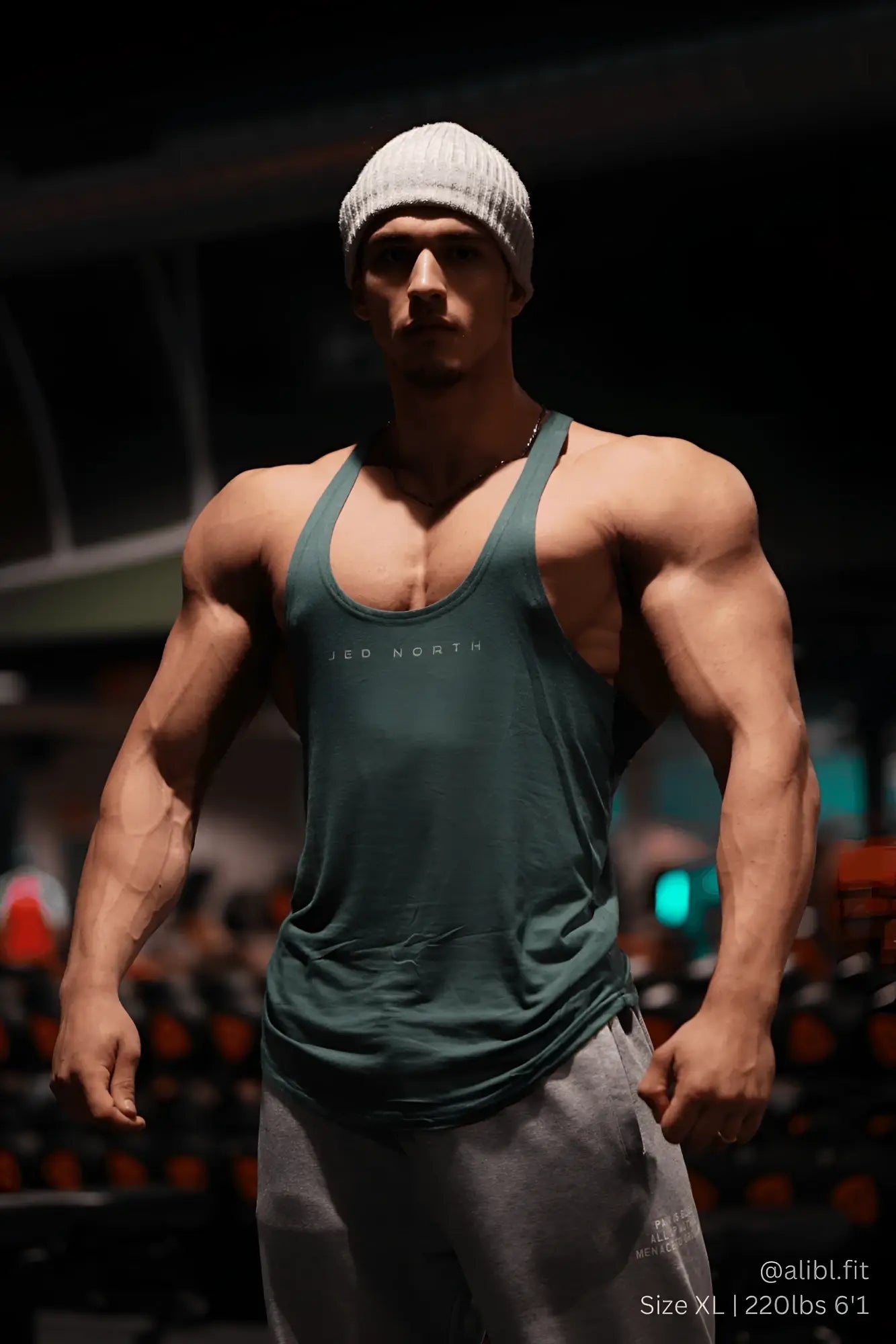 Dark green sleeveless tank top with jed north logo in white on chest classic bodybuilding racerback stringer sea green