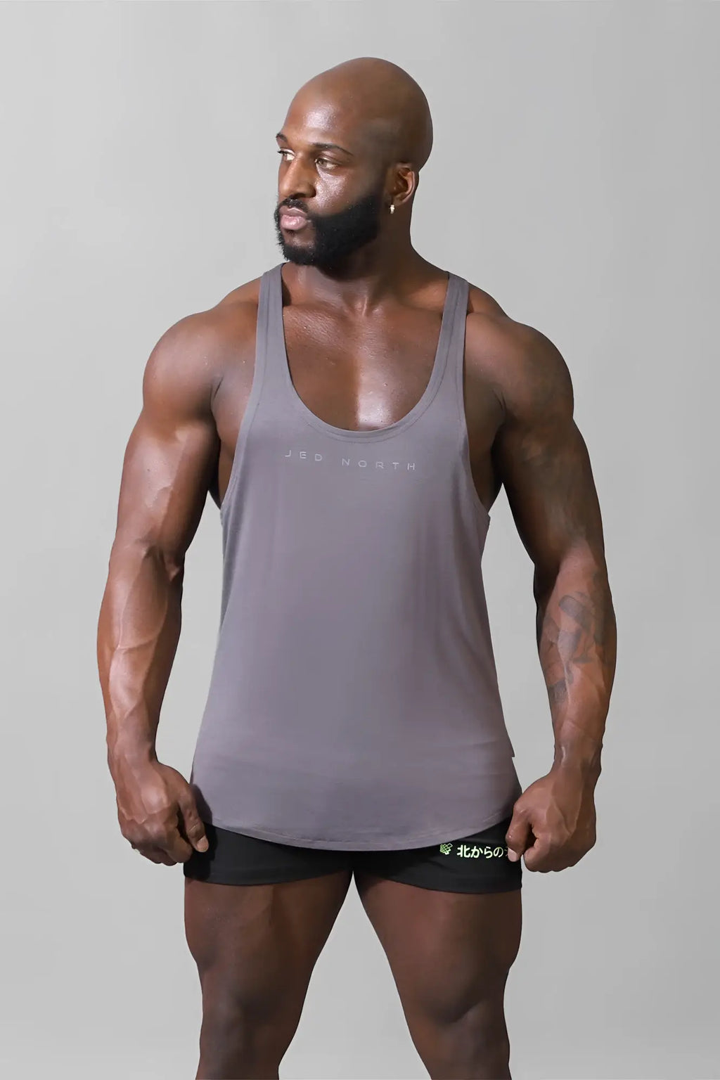 Jed North classic bodybuilding racerback stringer steel gray tank top with subtle minimalist logo across the chest