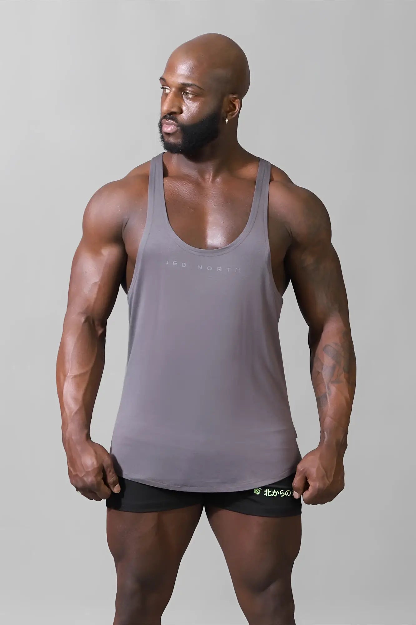 Jed North classic bodybuilding racerback stringer steel gray tank top with subtle minimalist logo across the chest