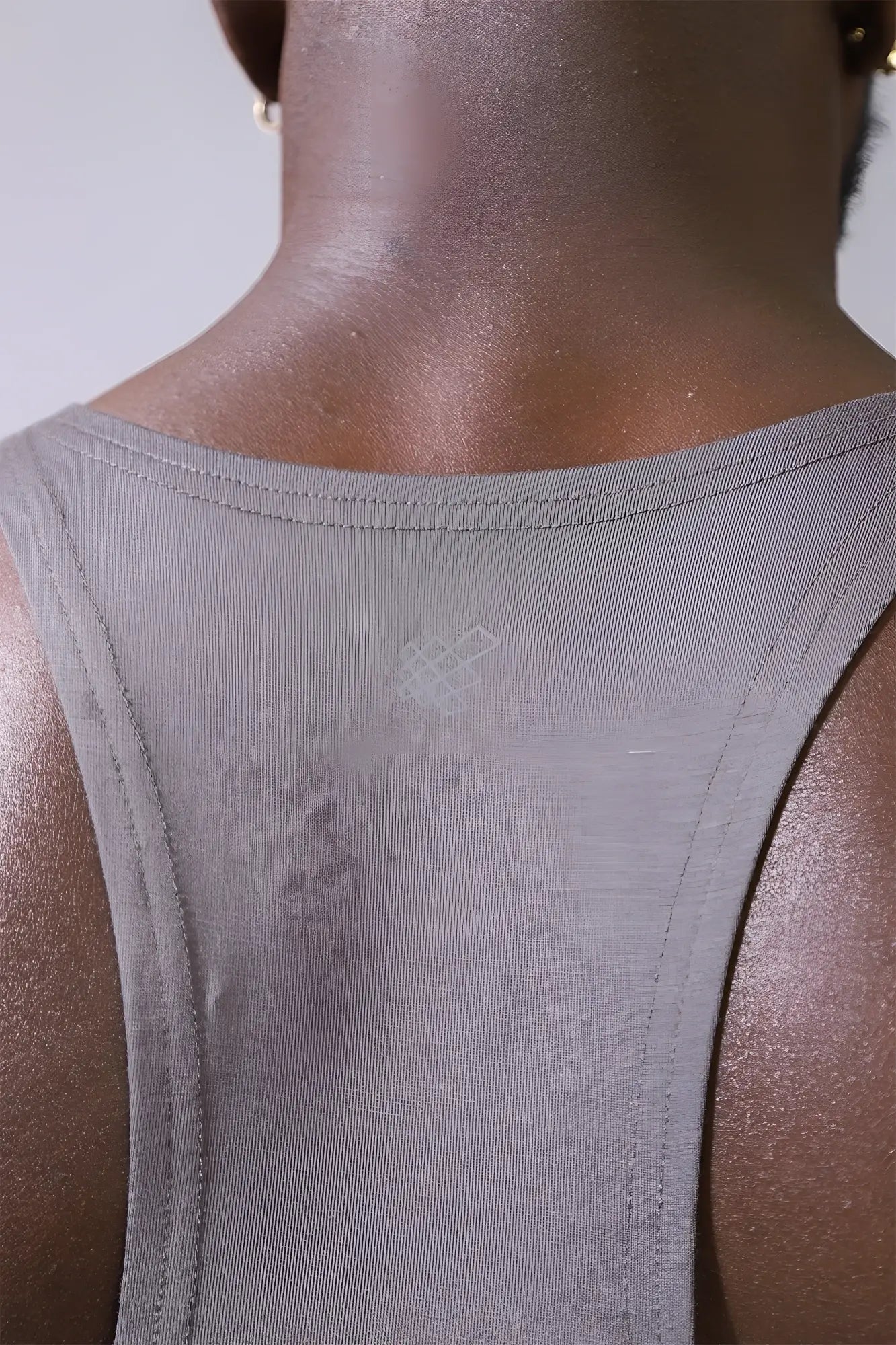 Back view of jed north classic bodybuilding racerback stringer in steel gray with ribbed fabric and subtle logo