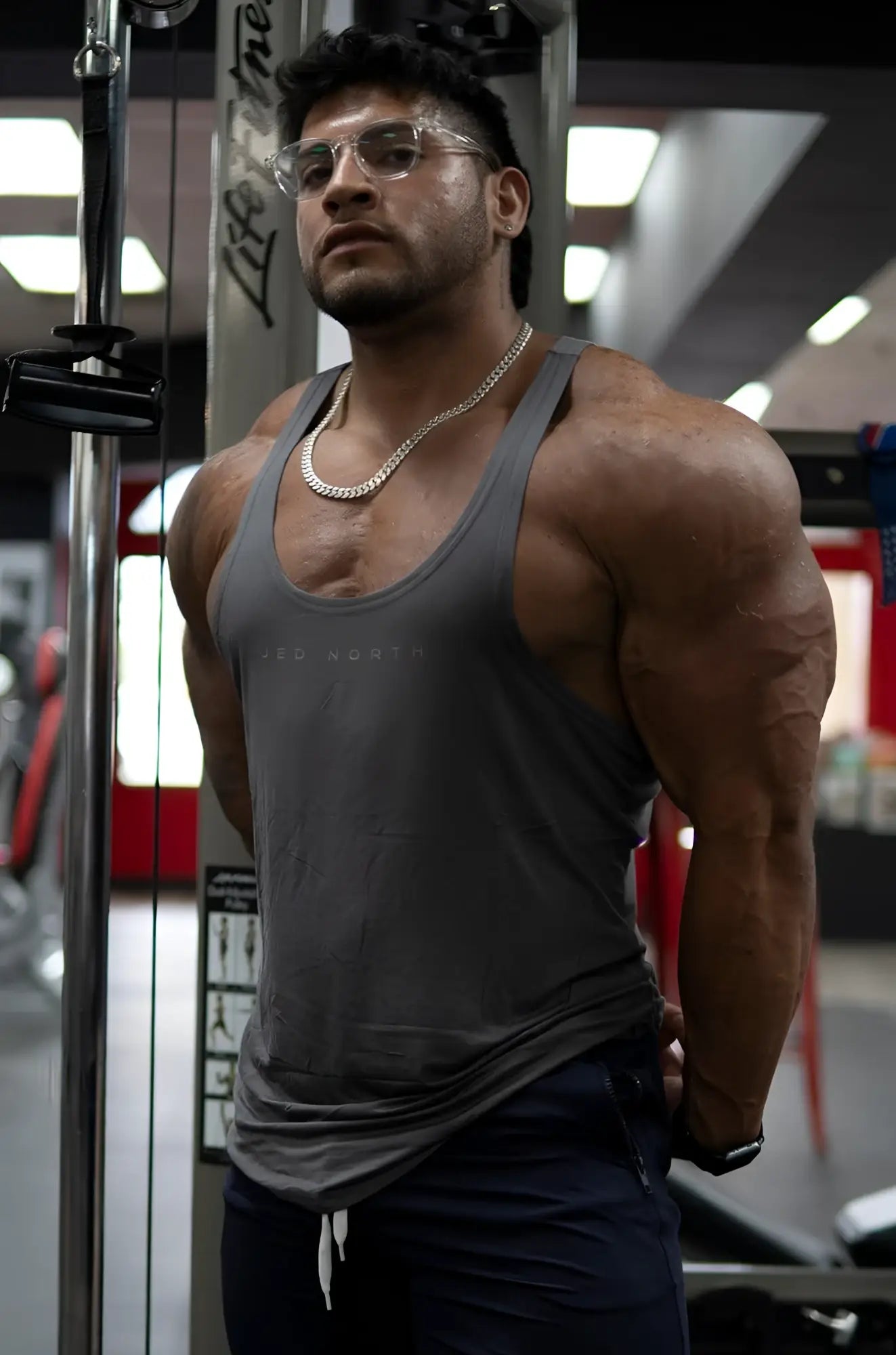Gray steel jed north classic bodybuilding racerback stringer tank top with printed logo across the chest