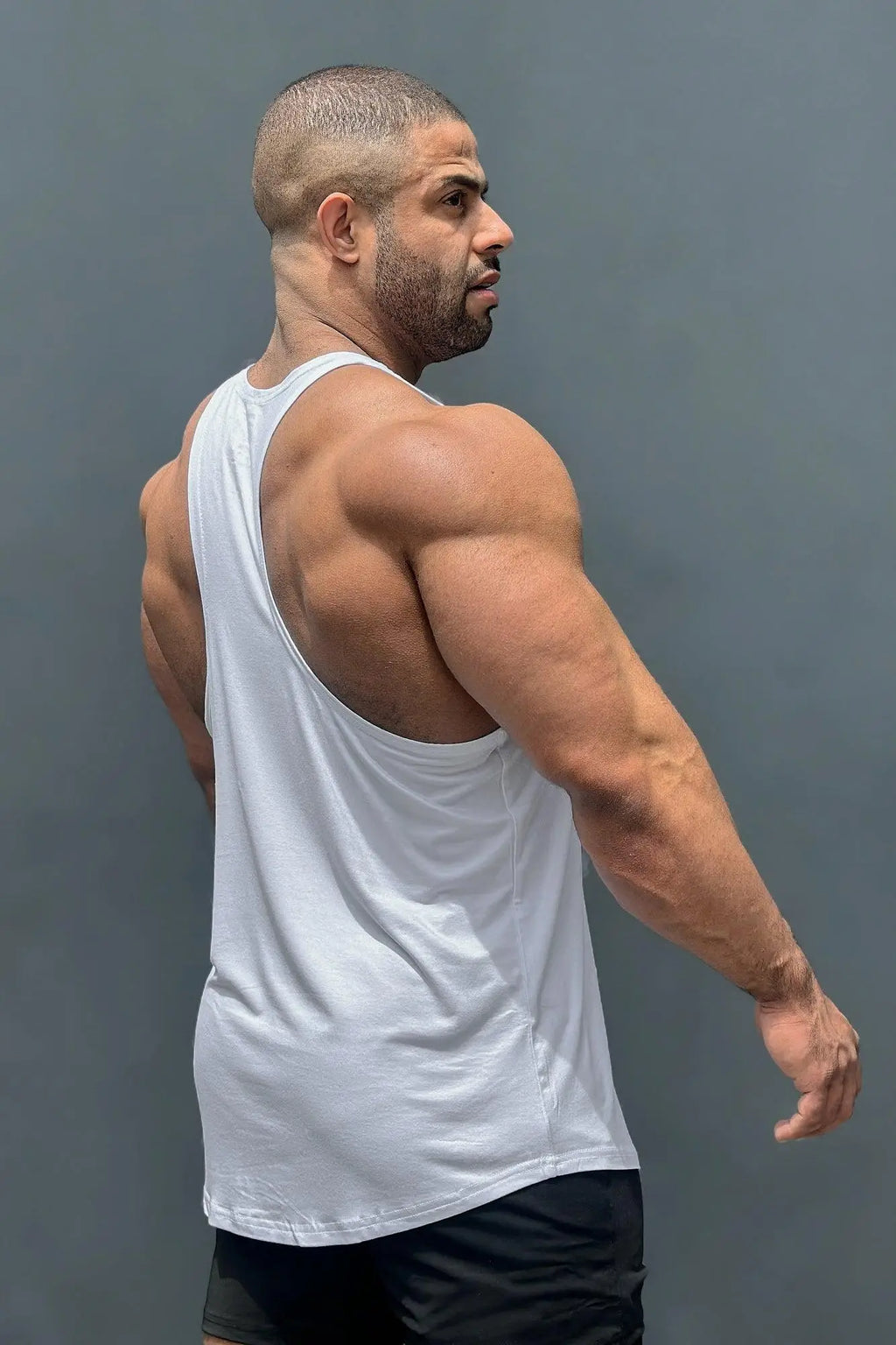 White classic bodybuilding racerback stringer tank top with a simple fitted design for athletic use