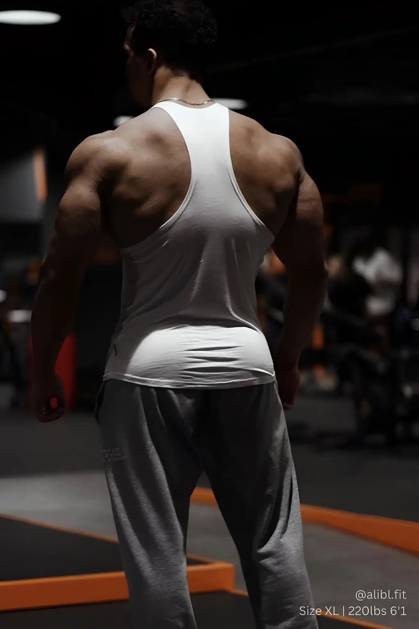 White racerback tank top made of soft cotton fabric from classic bodybuilding racerback stringer collection