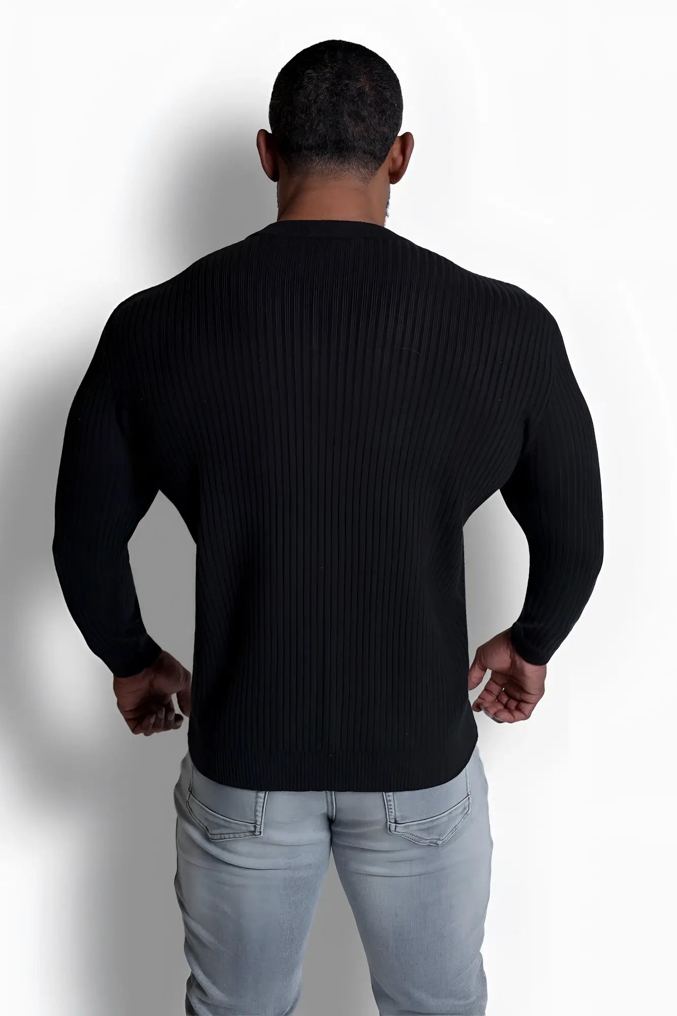 Black ribbed knit long sleeve classic henley sweater made from soft fabric for casual and layering use