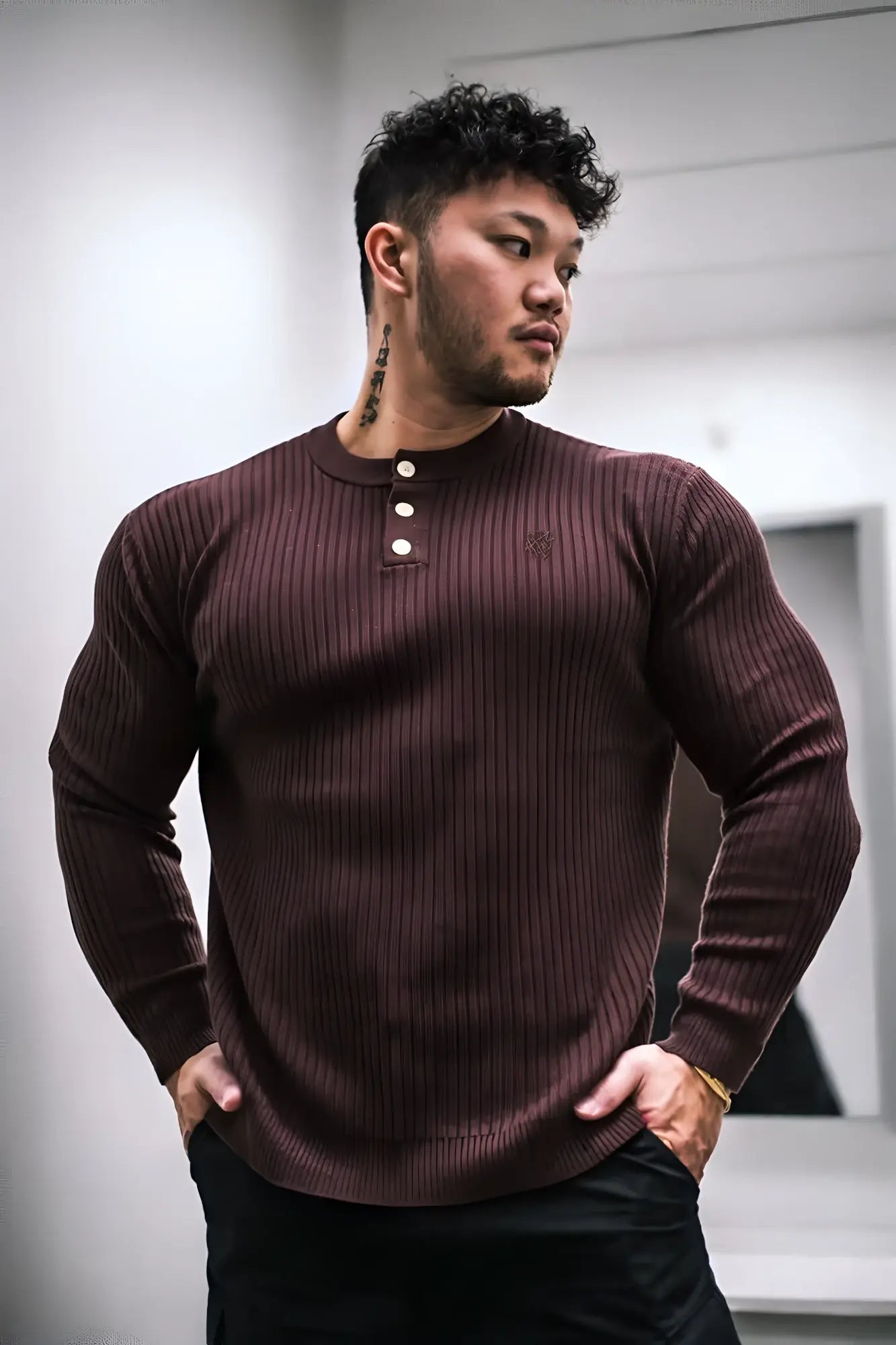 Classic henley sweater in brown maroon ribbed knit with three white buttons for casual wear