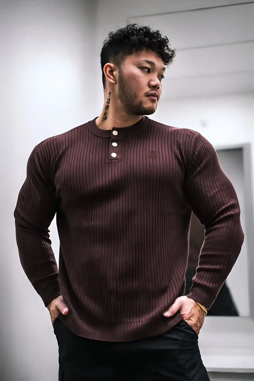 Classic henley sweater in brown maroon ribbed knit with three white buttons for casual wear