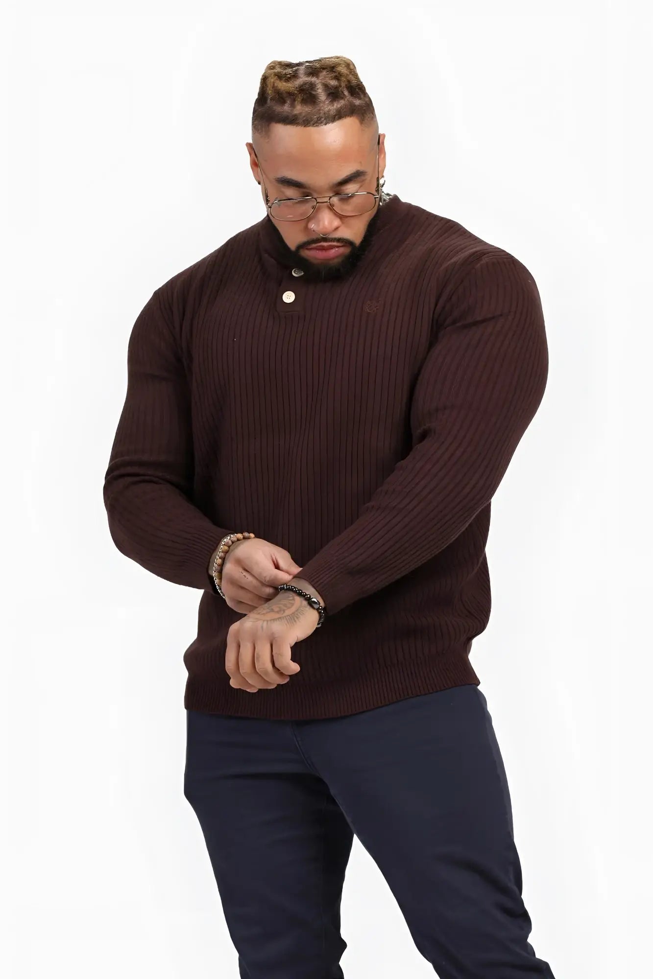 A rich brown classic henley sweater made of ribbed knit with a buttoned collar perfect for casual wear