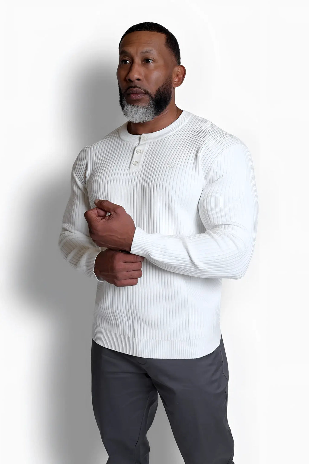 Classic henley sweater cream in white ribbed knit featuring long sleeves and button placket for casual wear