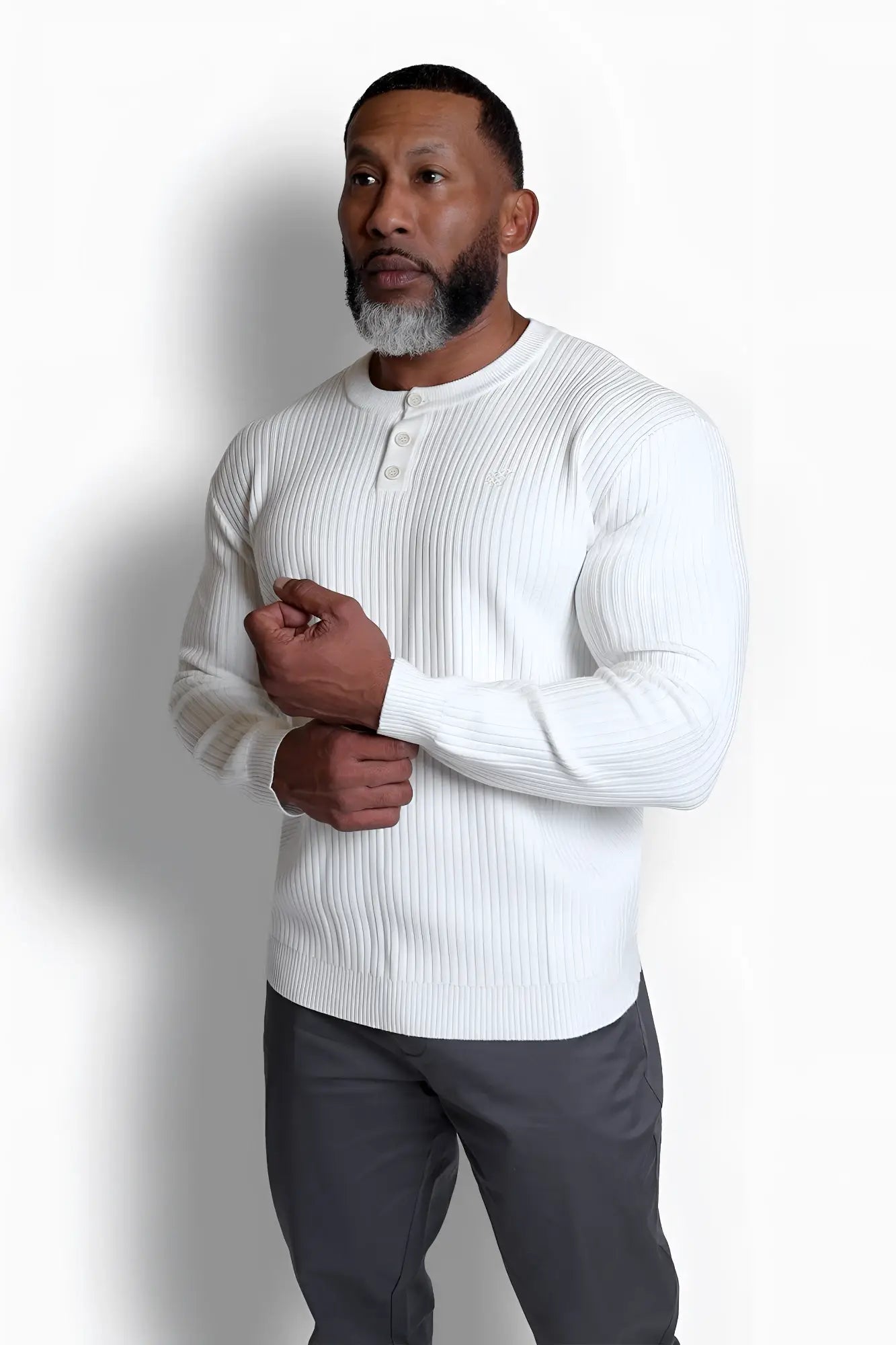 Classic henley sweater cream in white ribbed knit featuring long sleeves and button placket for casual wear