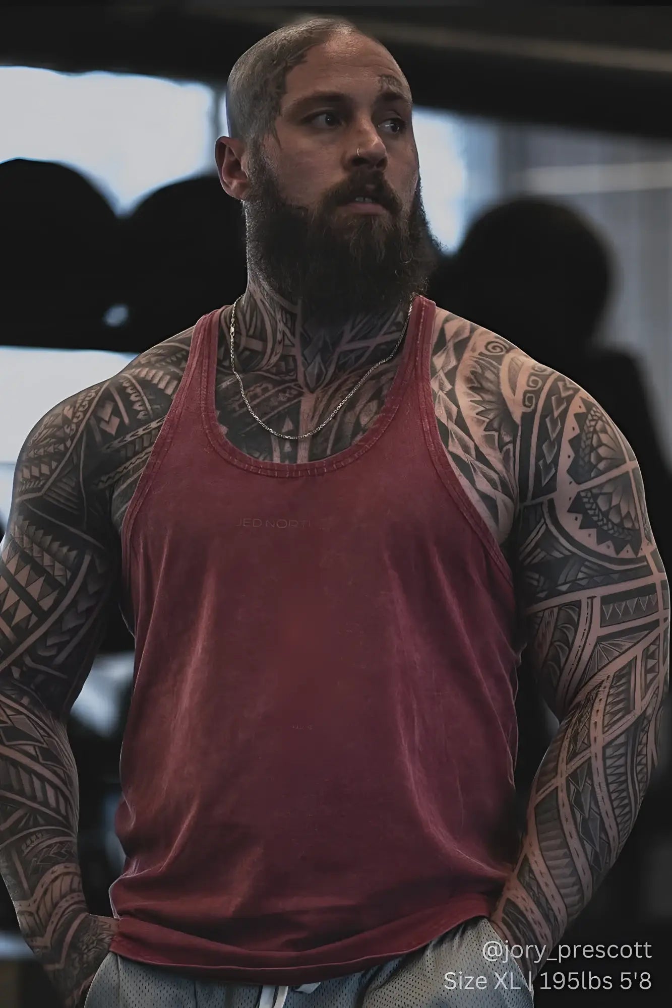 A faded red Jed North classic vintage washed racerback stringer tank top with subtle brand logo on the chest