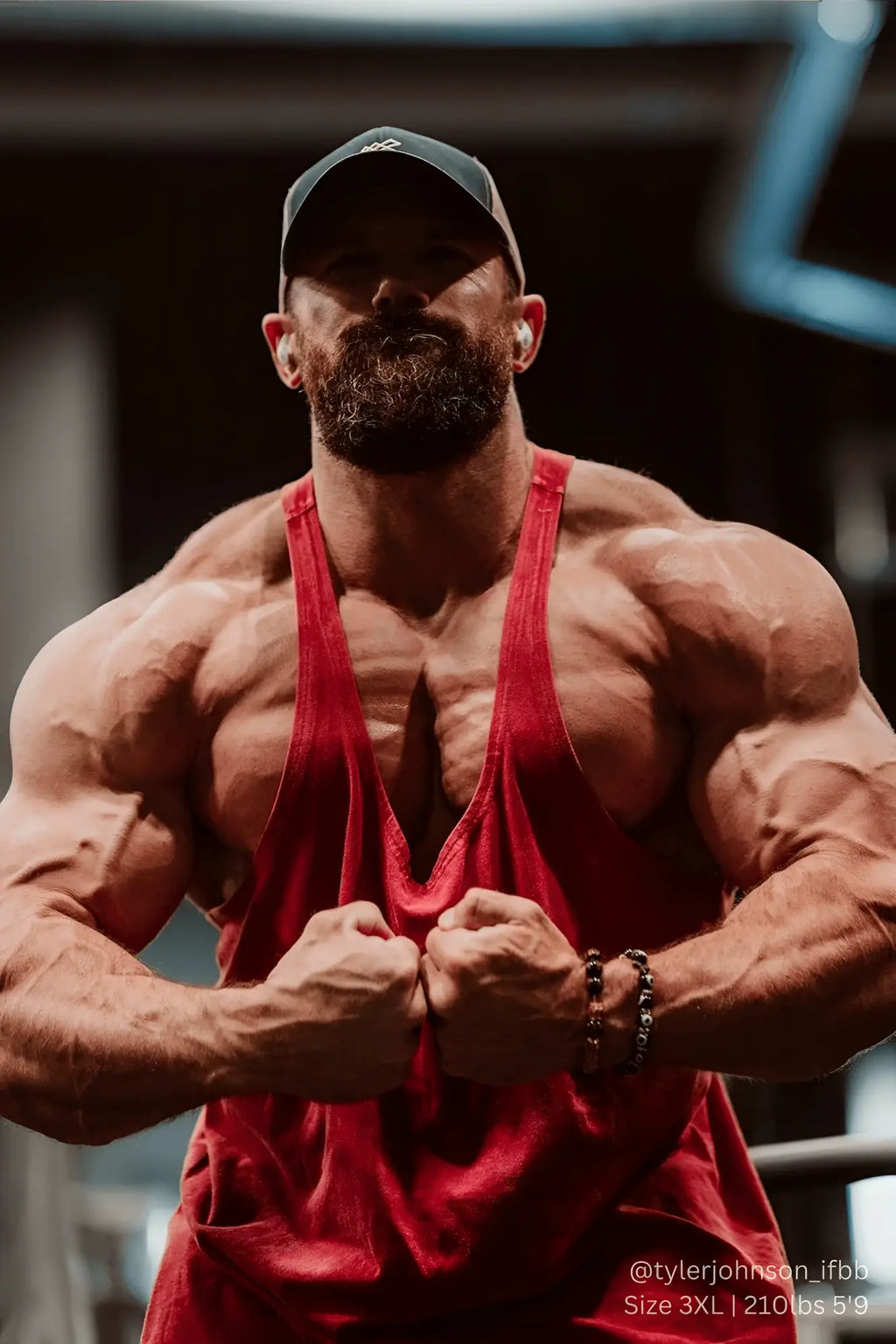 Red muscle tank top with vintage washed racerback stringer design by Jed North in crimson color