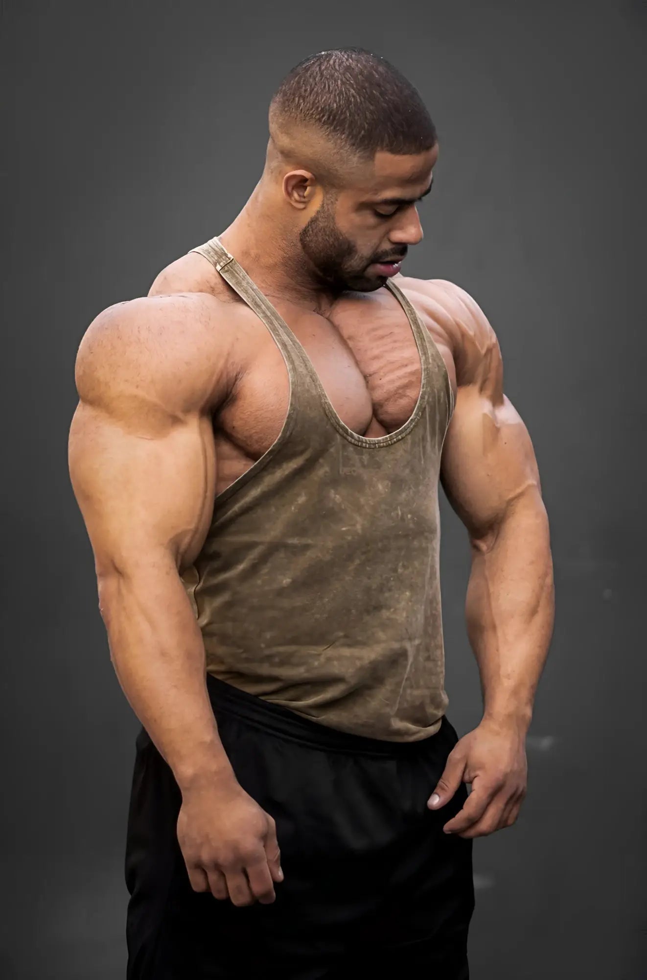 Classic vintage washed racerback stringer in hunter green with soft faded fabric and classic scoop neckline