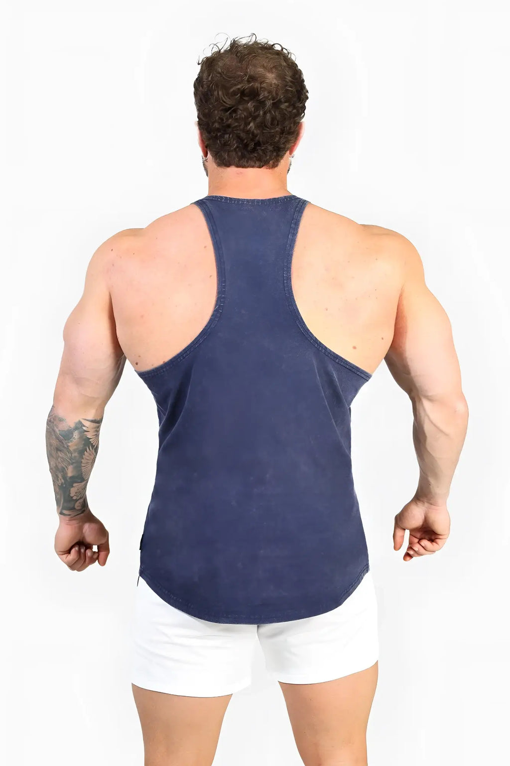 A navy blue distressed cotton tank top with a racerback design from jed north classic vintage washed racerback stringer