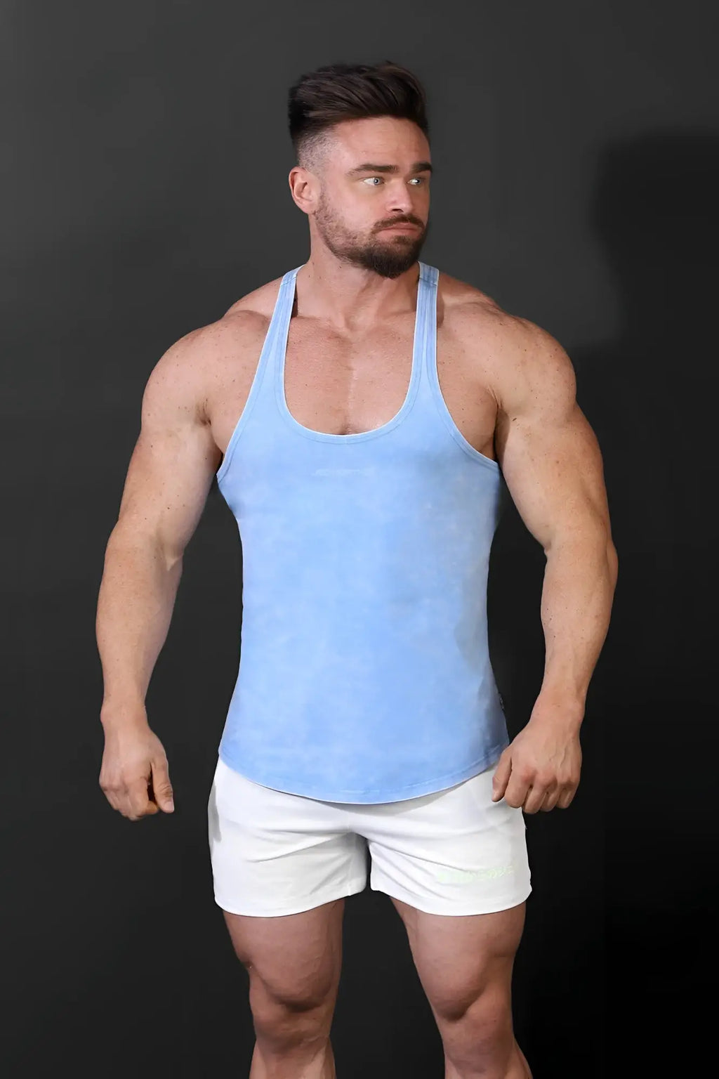 Light blue fitted tank top with subtle textured finish classic vintage washed racerback stringer style