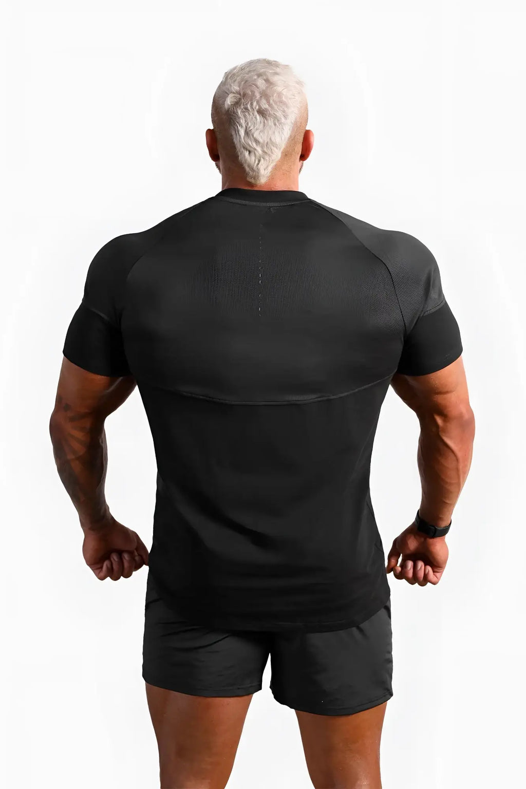 Back side of black jed north core mesh workout t-shirt 2.0 with textured mesh back panel and seamless construction