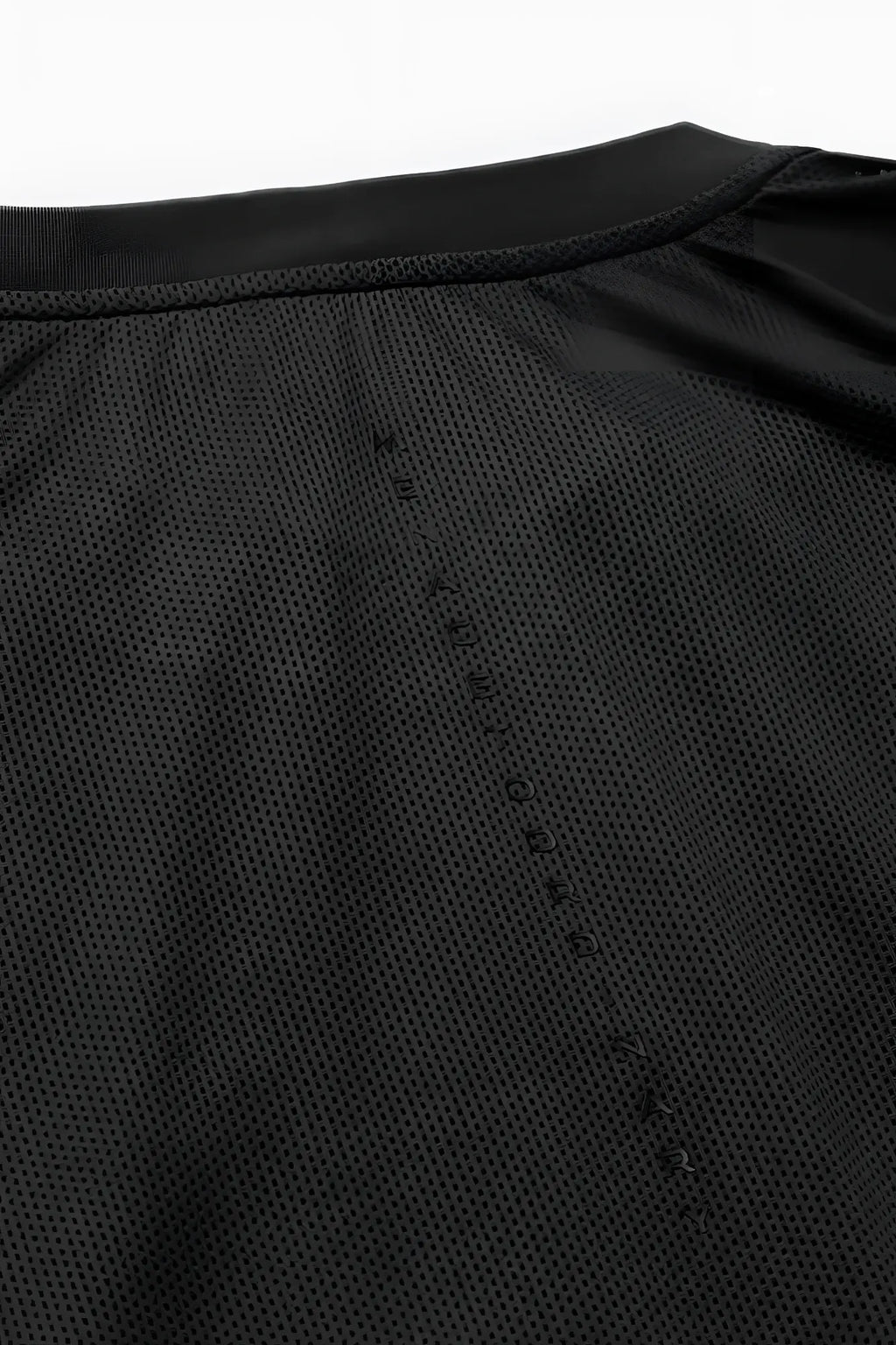 Back of jed north core mesh workout t shirt 2.0 black showing breathable black mesh fabric with vertical text detailing