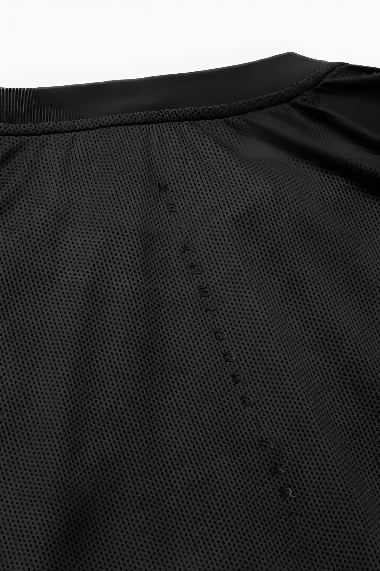 Back of jed north core mesh workout t shirt 2.0 black showing breathable black mesh fabric with vertical text detailing