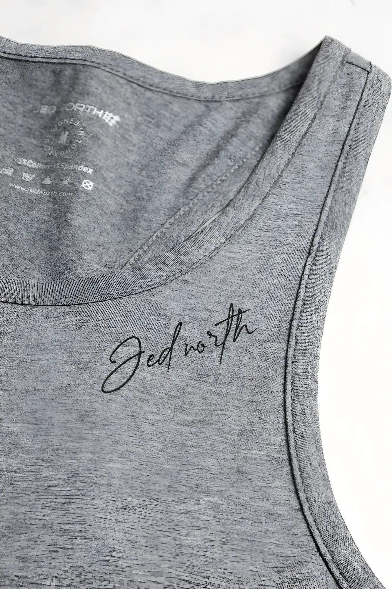 Gray heathered cotton training stringer tank top with jedworth embroidered in black cursive across the chest