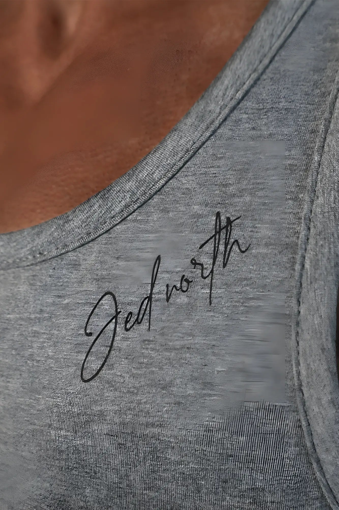 Gray heathered cotton training stringer tank top with black cursive jedworth logo embroidered on the chest