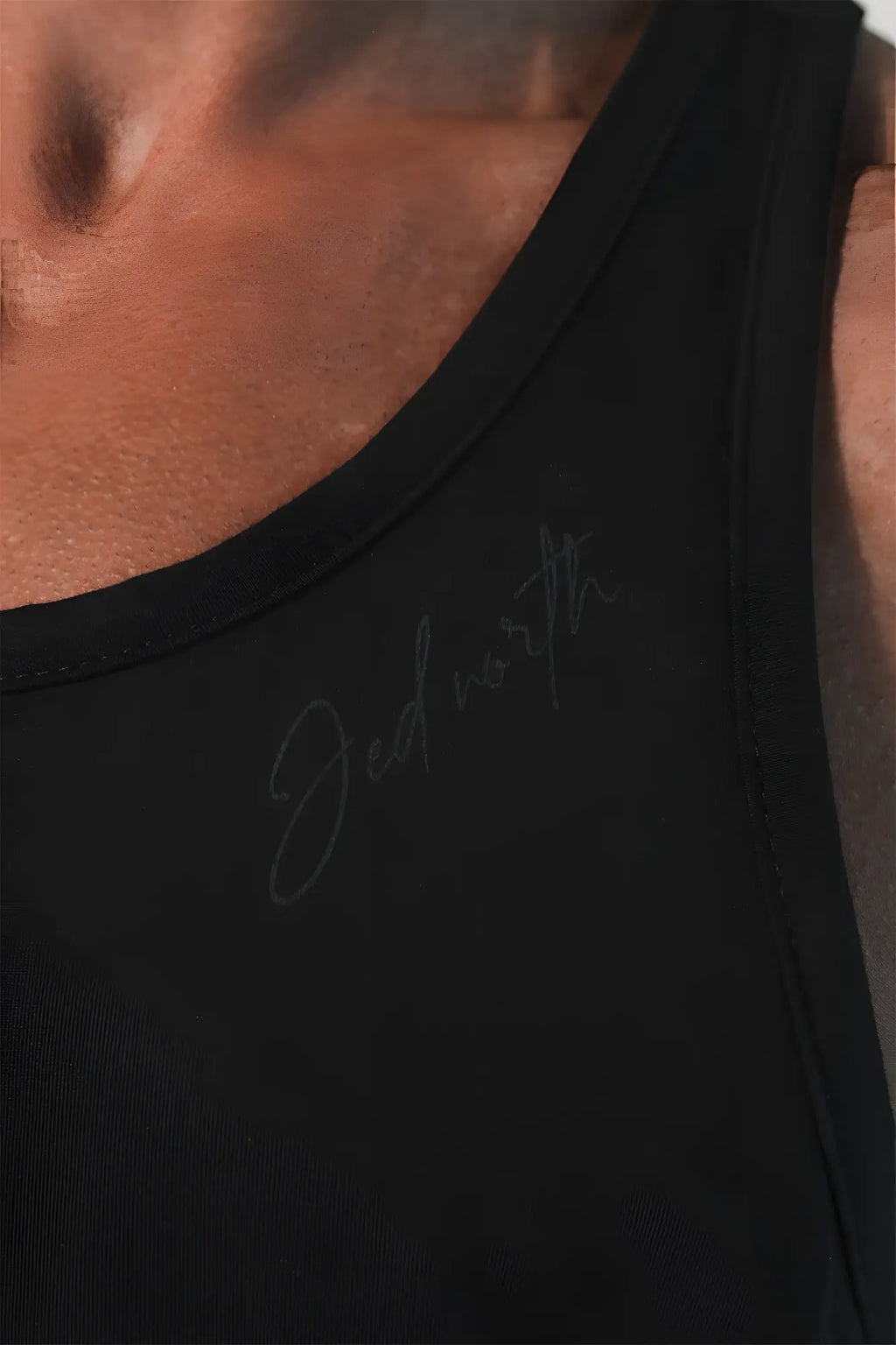 Black cotton sleeveless training stringer tank top with subtle gray cursive jed worth logo embroidered midnight