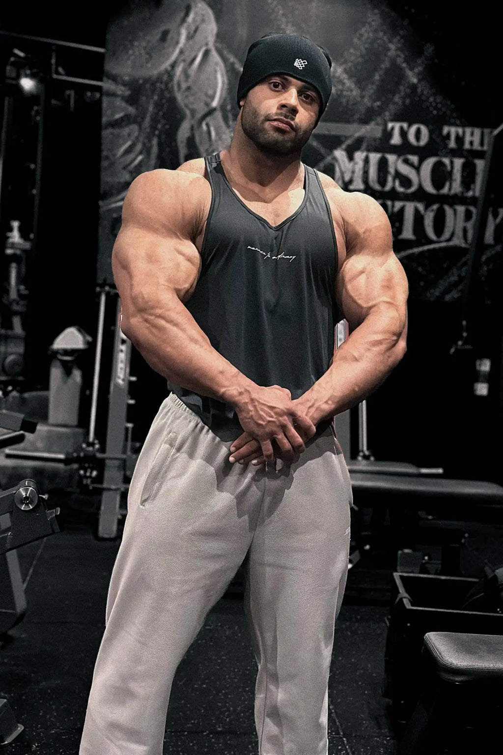Jed North dynamic bodybuilding stringer tank top in dark gray with a small white chest logo for gym workouts