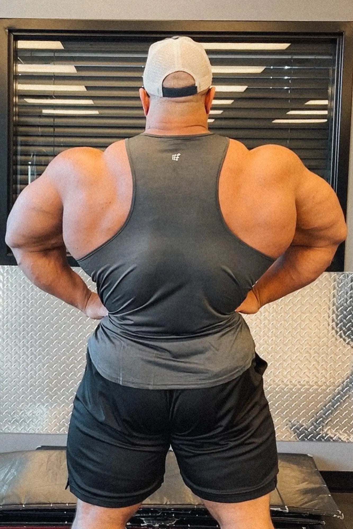 Jed North dynamic bodybuilding stringer dark gray sleeveless athletic tank top back with small white logo