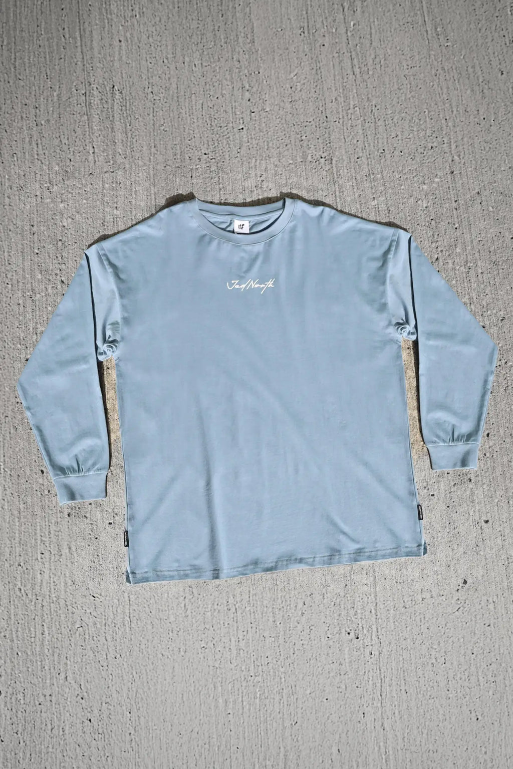 Jed North Energy oversized long sleeve t-shirt 2.0 in arctic blue with a subtle white cursive logo on the chest